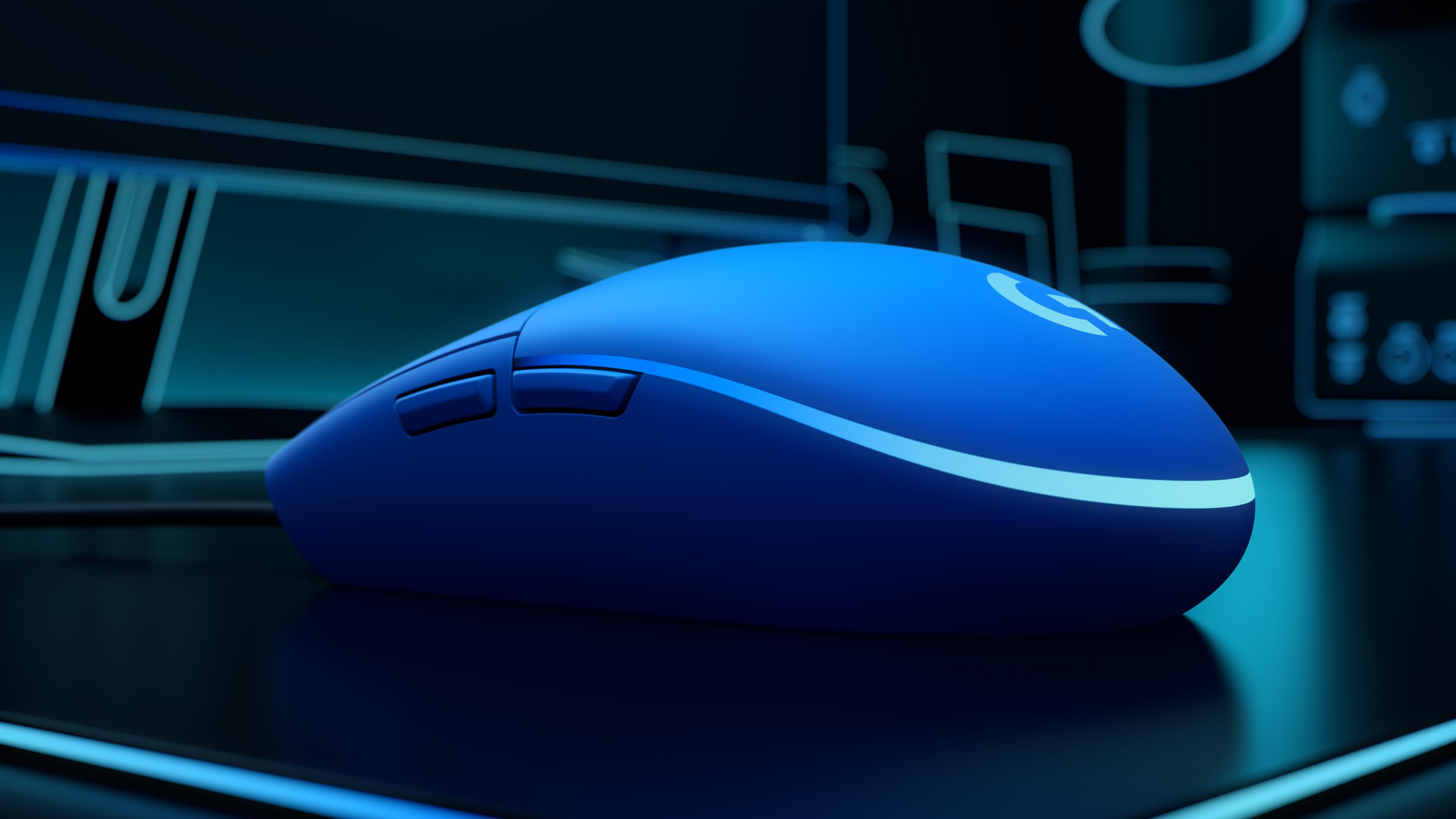 A blue computer mouse with glowing accents on a dark, reflective surface.