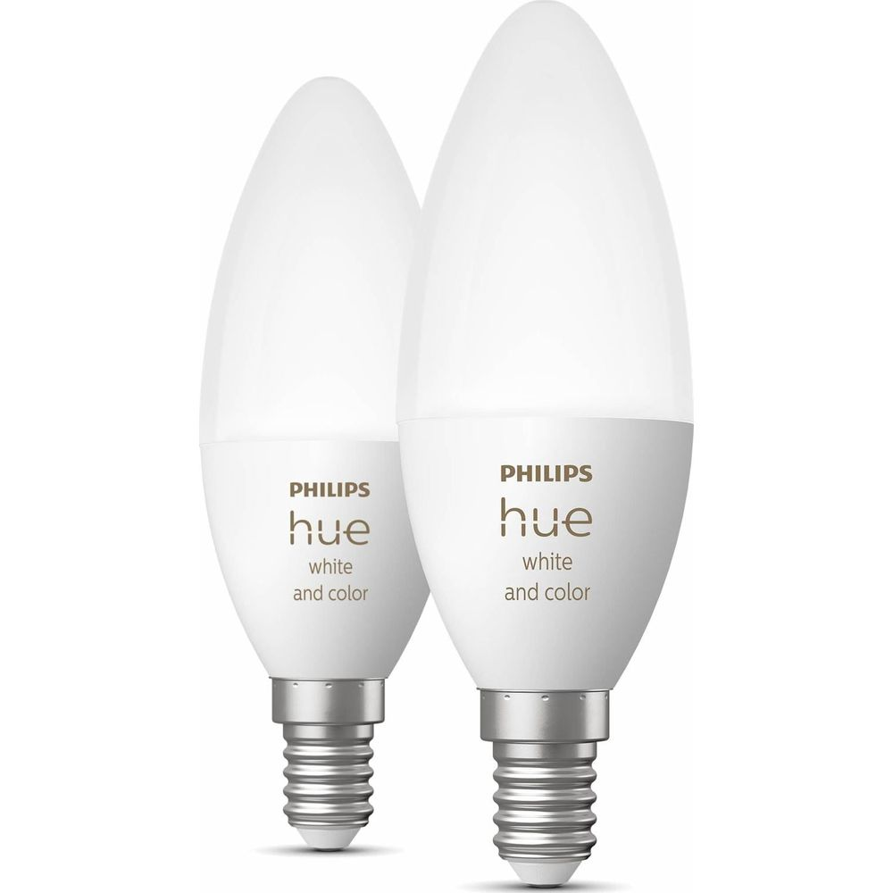 Dwie żarówki Philips Hue, białe z gwintowanym trzonkiem.