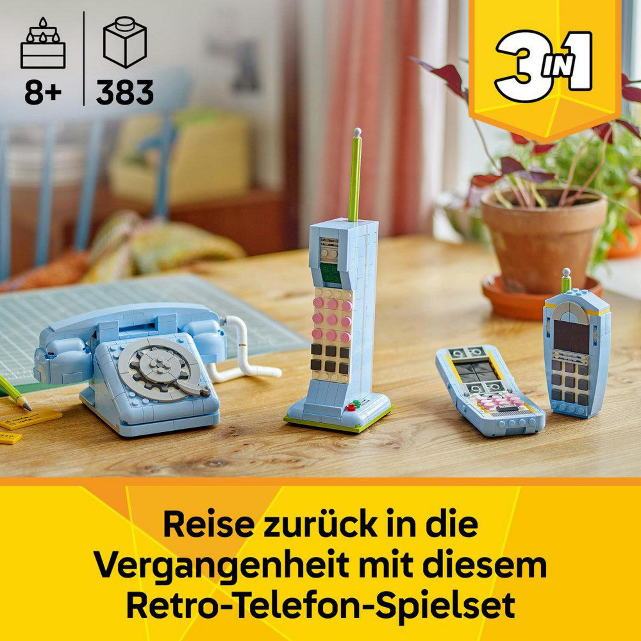 Retro telefon, cep telefonu ve kapaklı telefon içeren bir yapım seti.