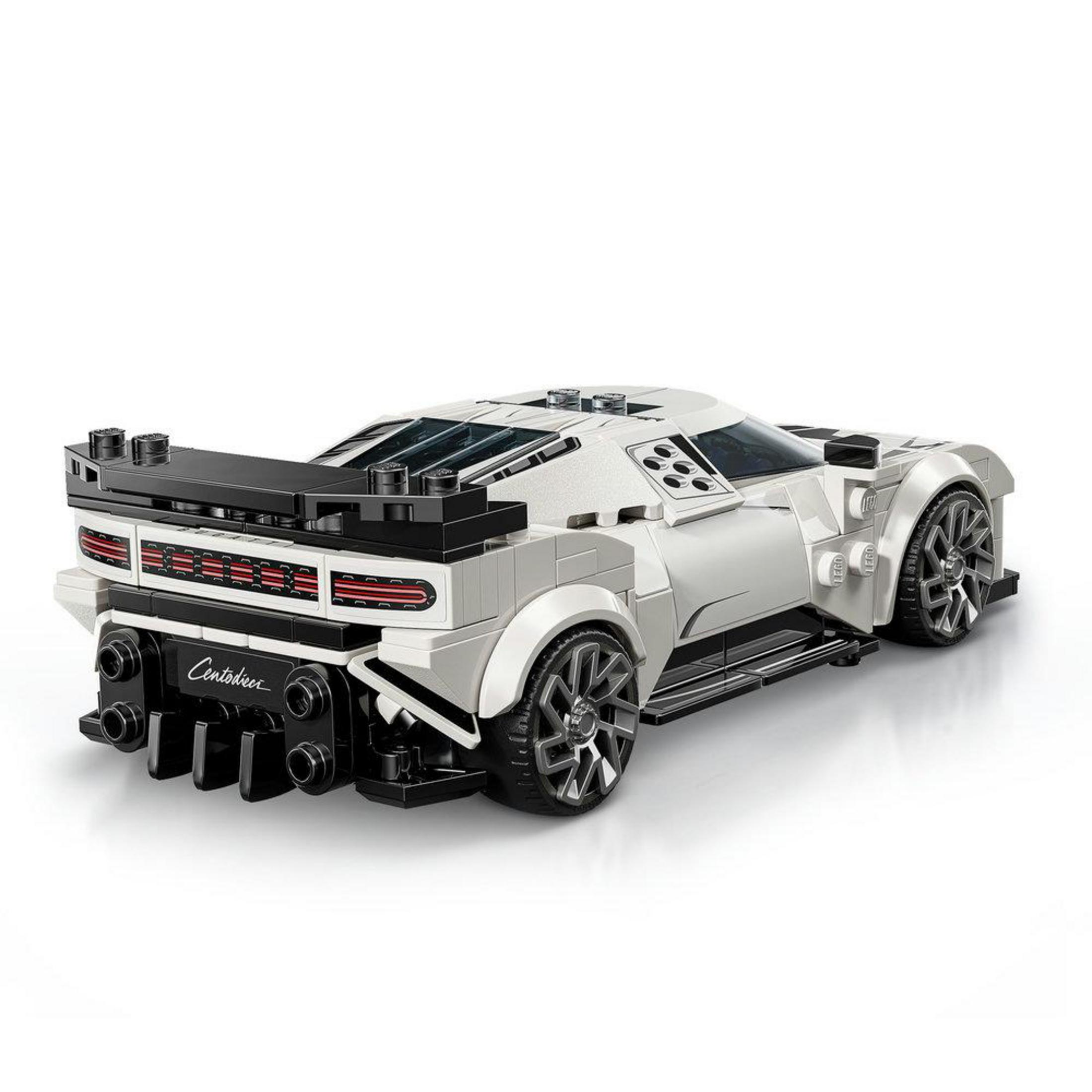 Biały model samochodu sportowego Lego z czarnym spojlerem i czerwonymi światłami.