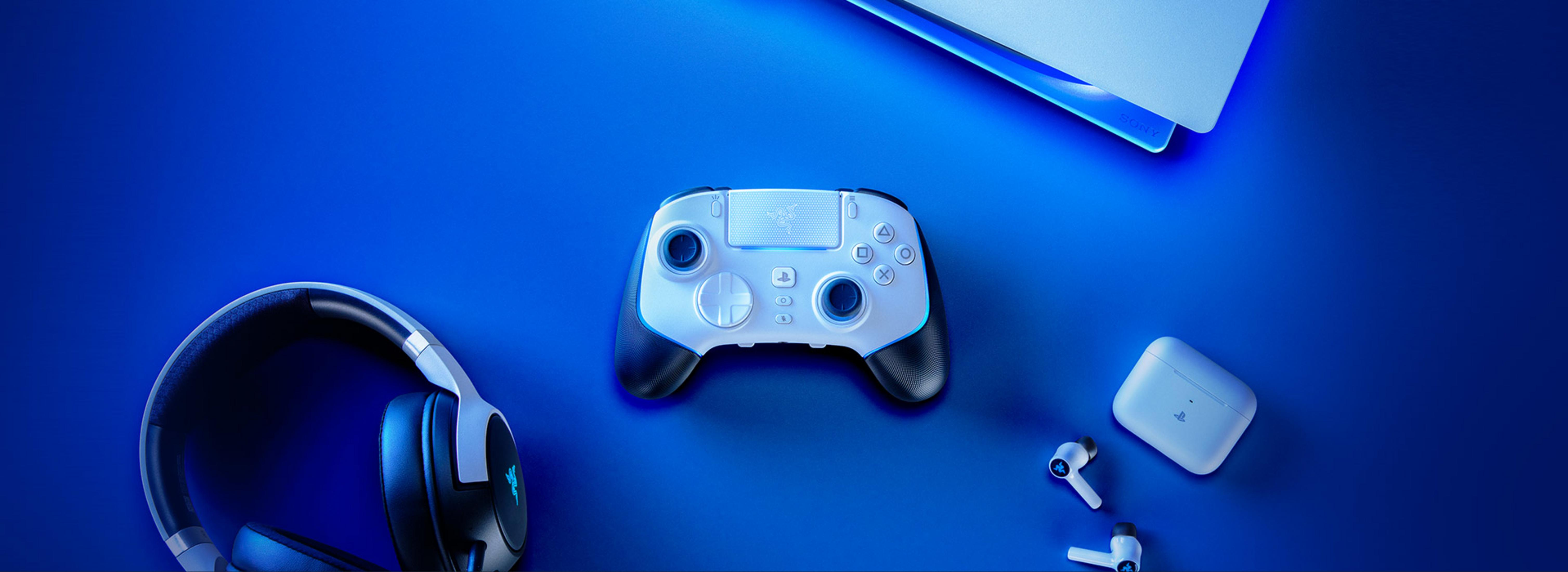 A white controller, headphones, and earbuds on a blue background.