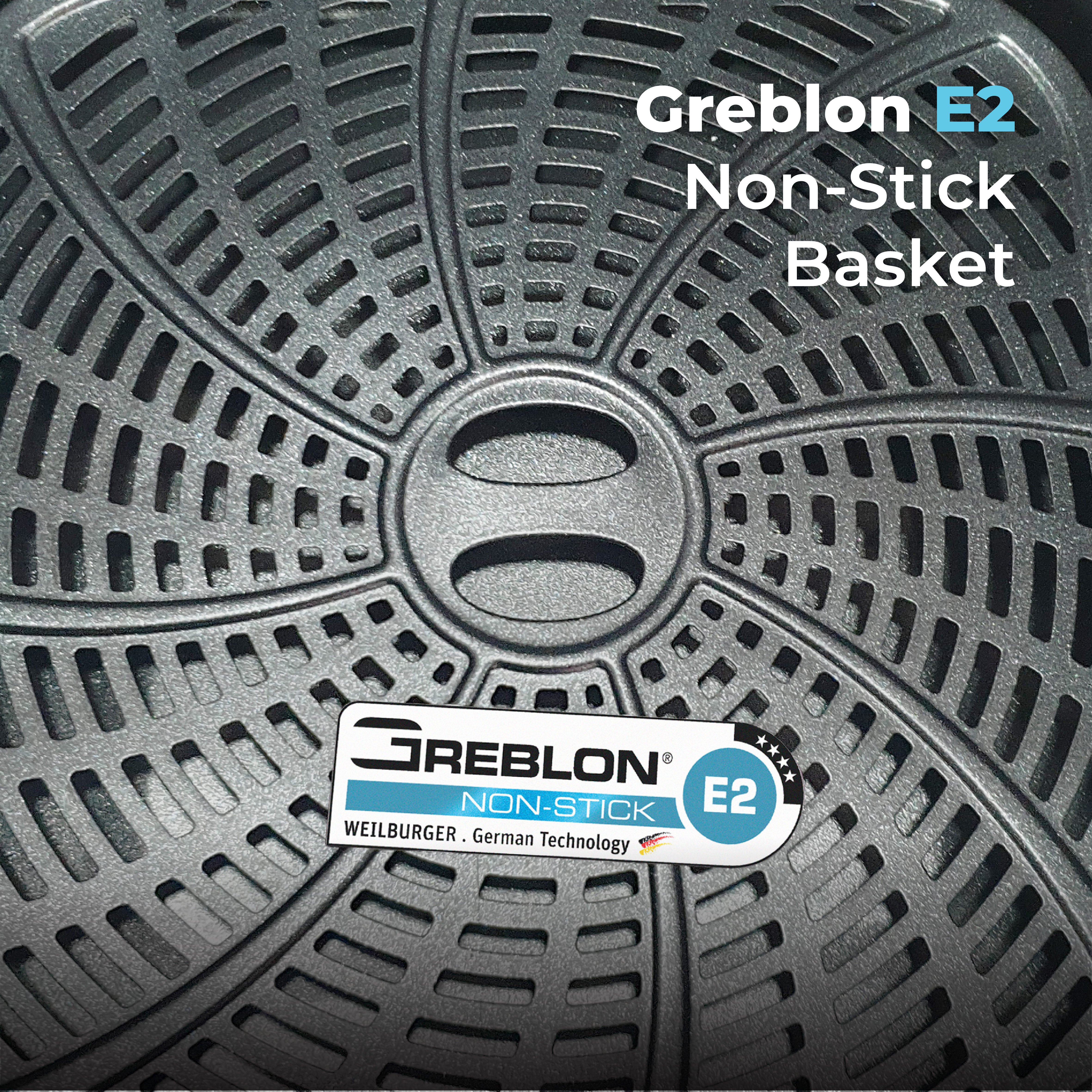 Cesta antiadherente Greblon E2 gris con patrón perforado y logo.