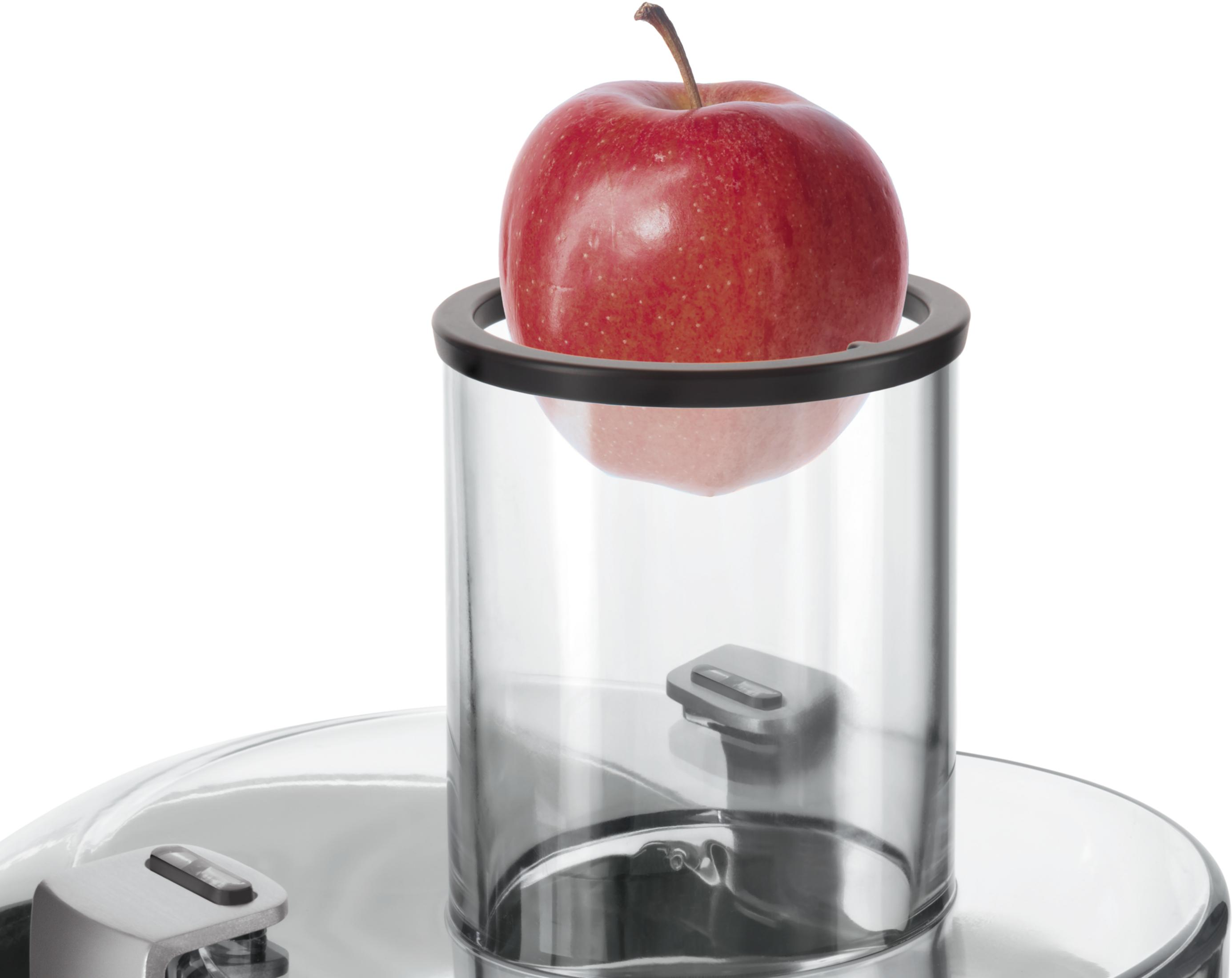 Une pomme rouge dans un récipient transparent avec des accents métalliques.