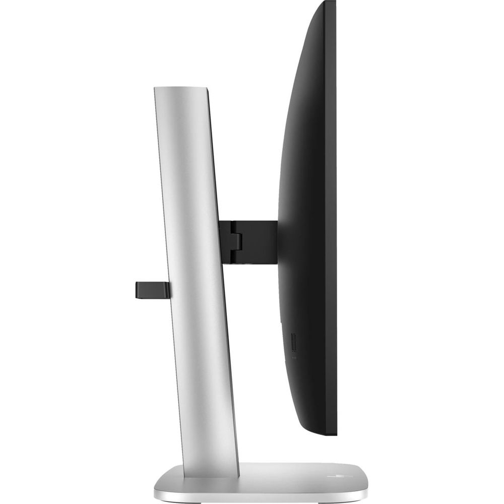 Vista laterale di un monitor moderno con supporto argentato su sfondo bianco.