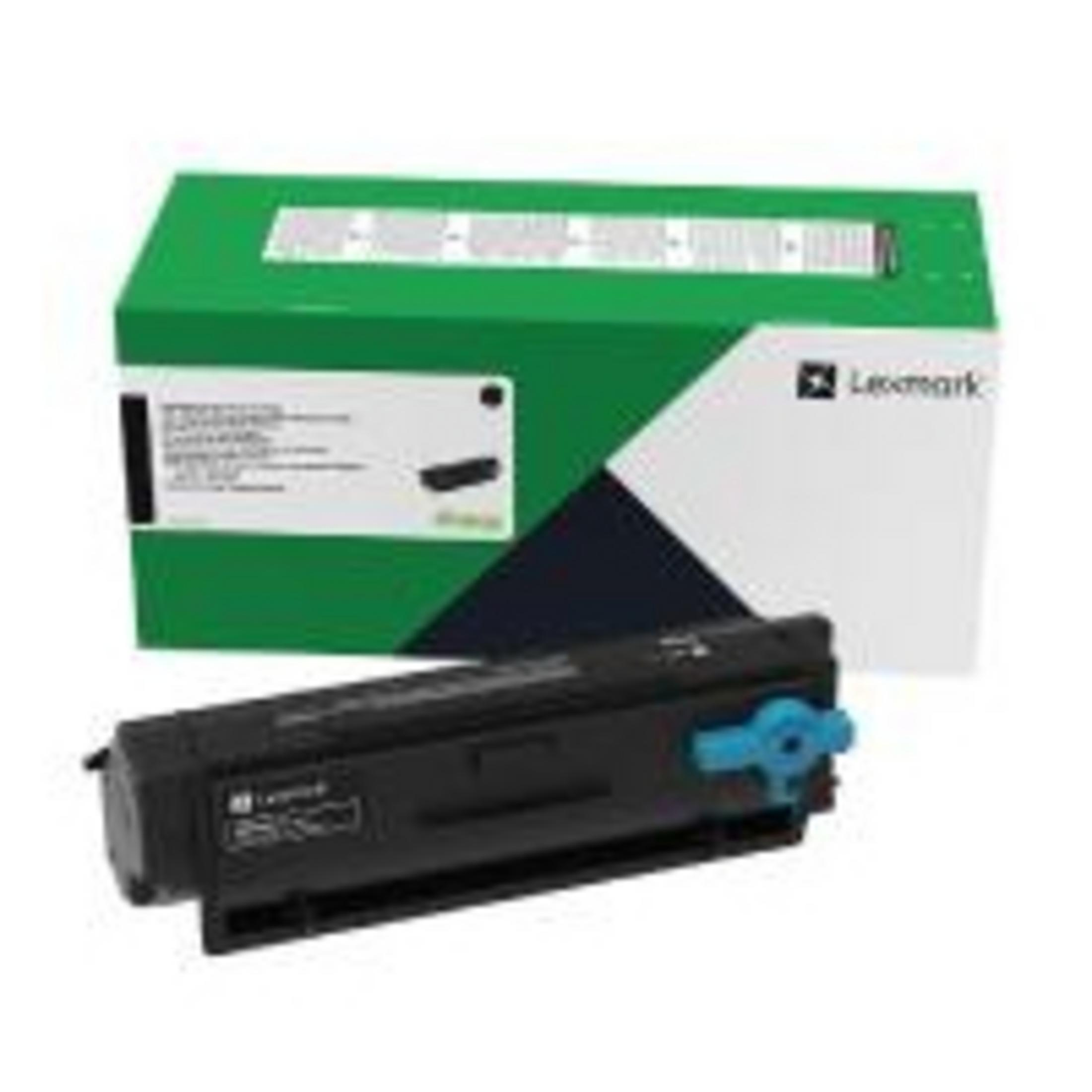 Une cartouche de toner Lexmark noire est devant une boîte verte et blanche.