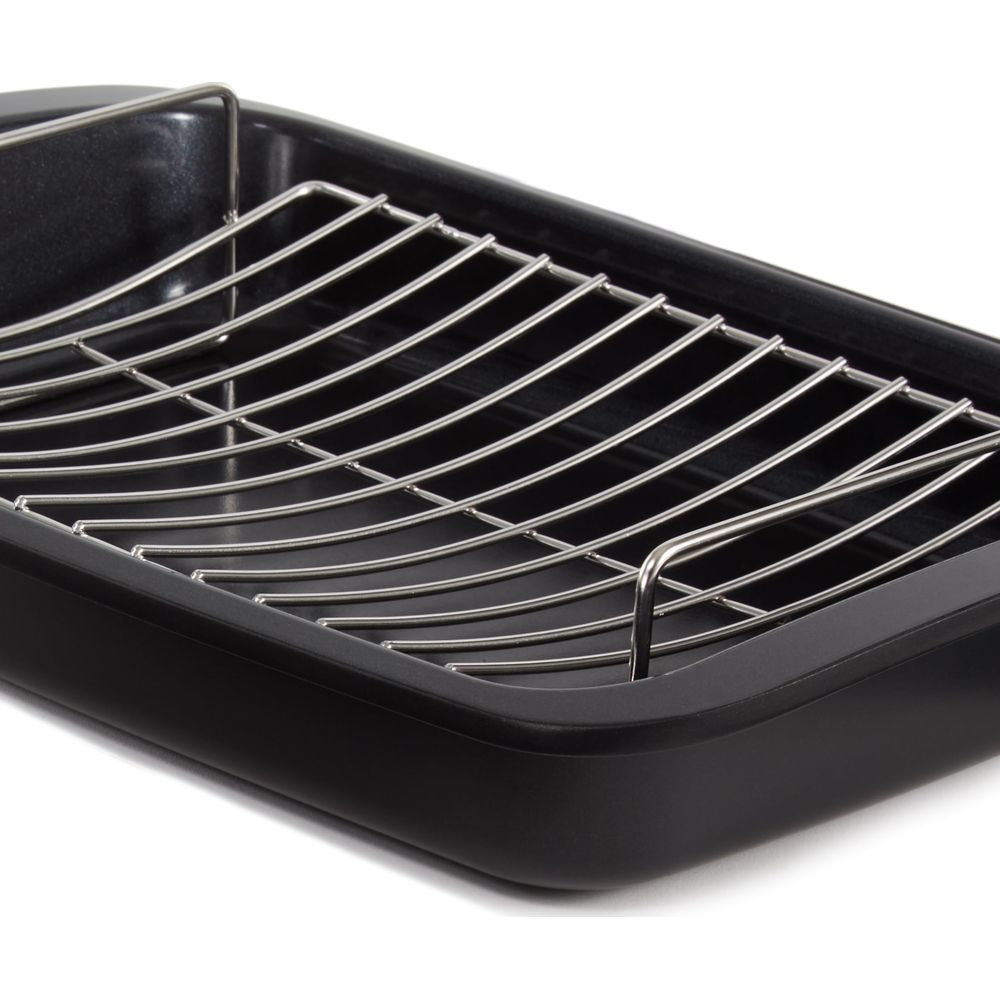 A black roasting pan with a metal rack.