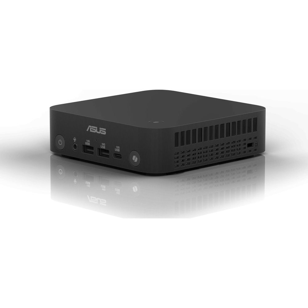 Czarny mini PC Asus z portami z przodu i otworami wentylacyjnymi z boku.