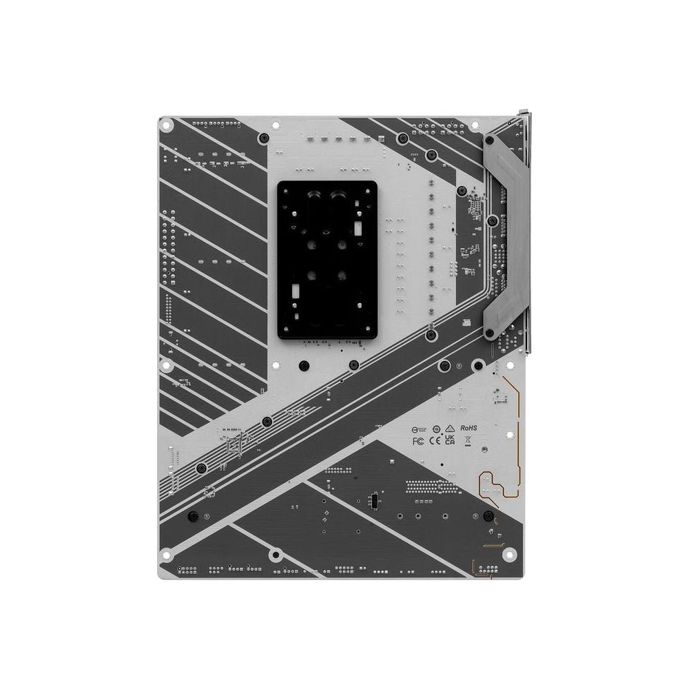 Tył płyty głównej z srebrnymi i czarnymi liniami oraz czarnym kwadratowym obiektem.