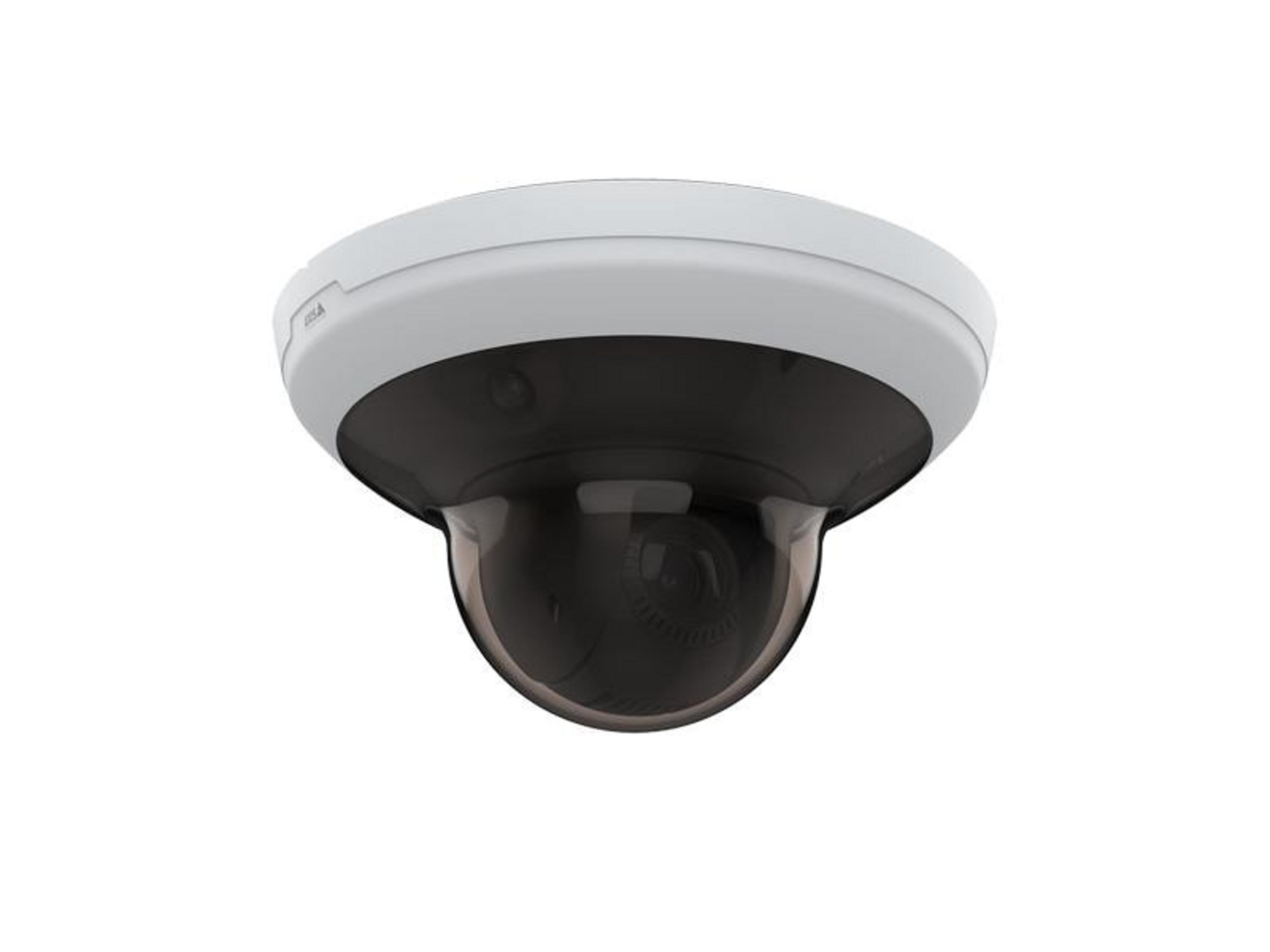 Biała kamera monitorująca z ciemną kopułą jest wyizolowana na białym tle.