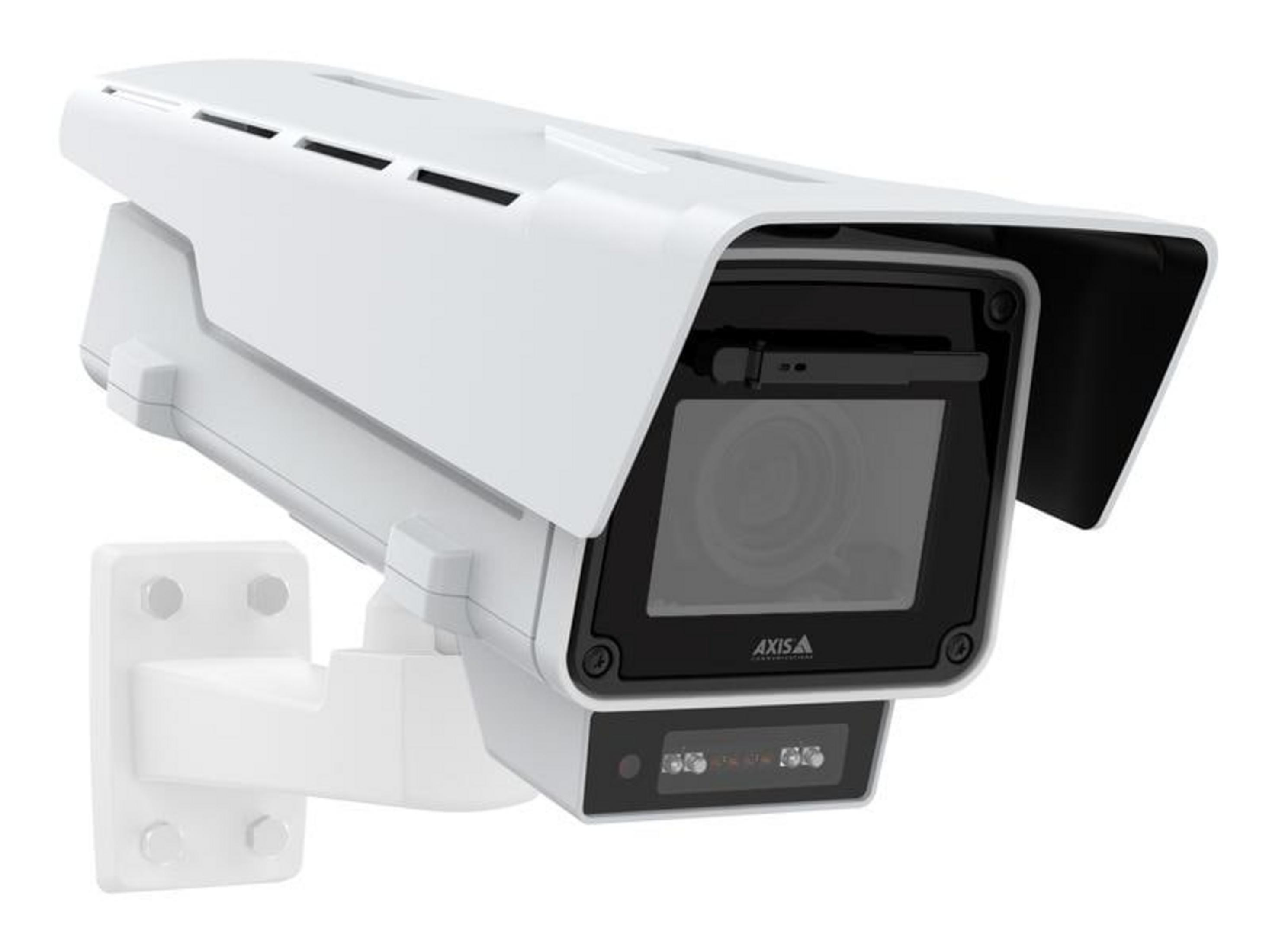 Biała kamera monitoringu z czarnym obiektywem i mocowaniem.