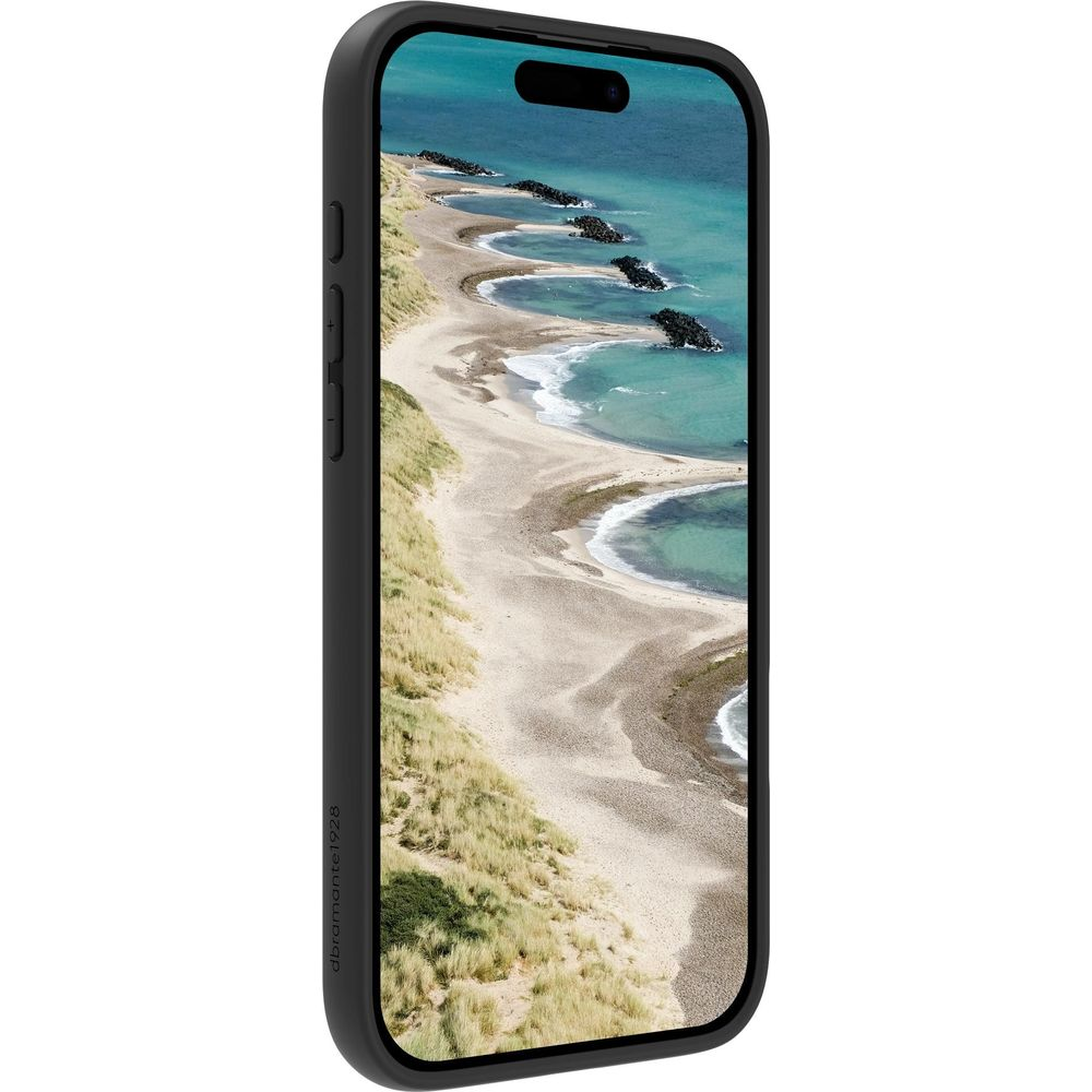 Un telefono nero mostra un paesaggio costiero con onde e rocce.