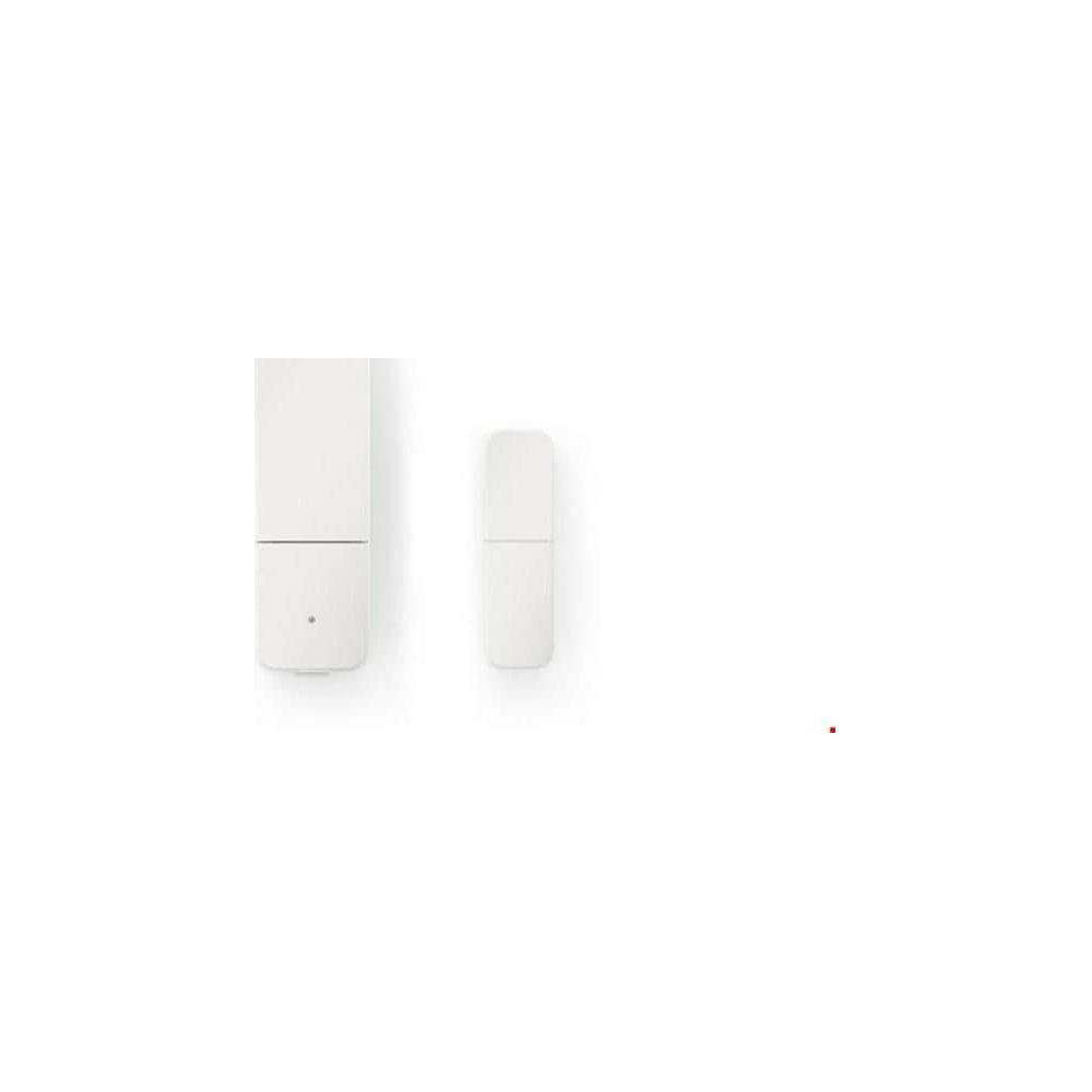 Dwa białe czujniki leżą obok siebie na białym tle.