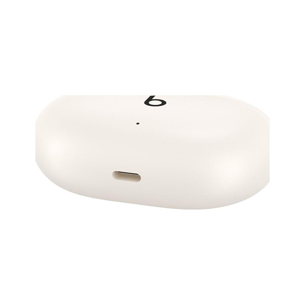 Białe etui ładujące z logo Beats i portem ładowania.