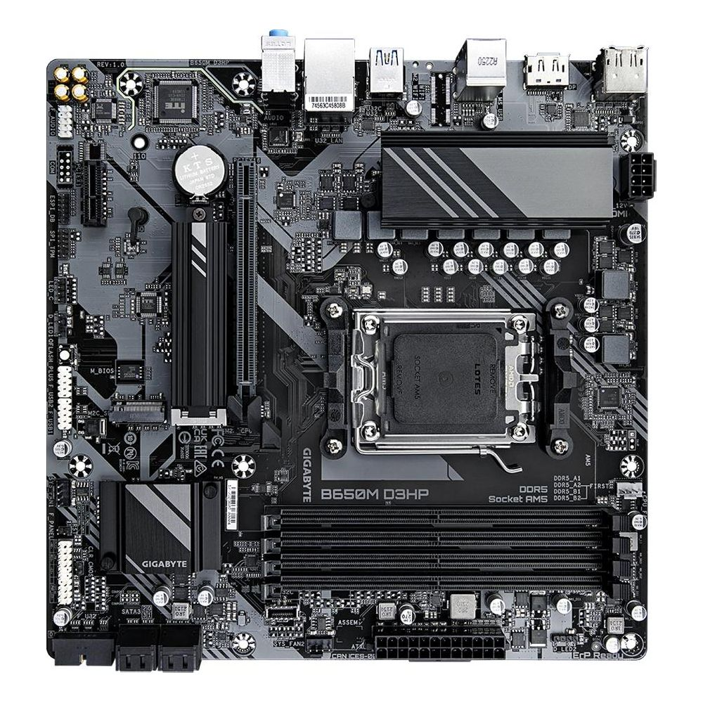 Szara płyta główna z gniazdem CPU, slotami RAM i złączami.