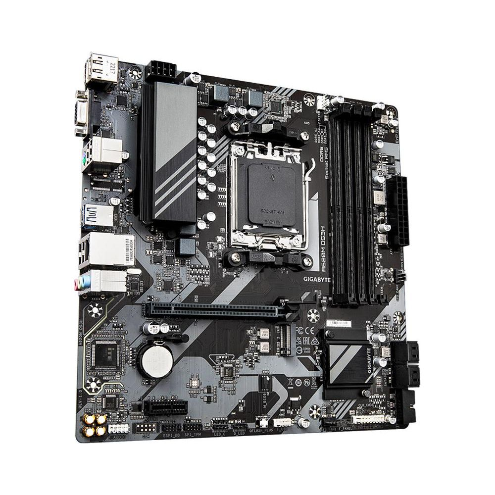 Płyta główna komputera z wieloma szarymi i czarnymi portami i komponentami.