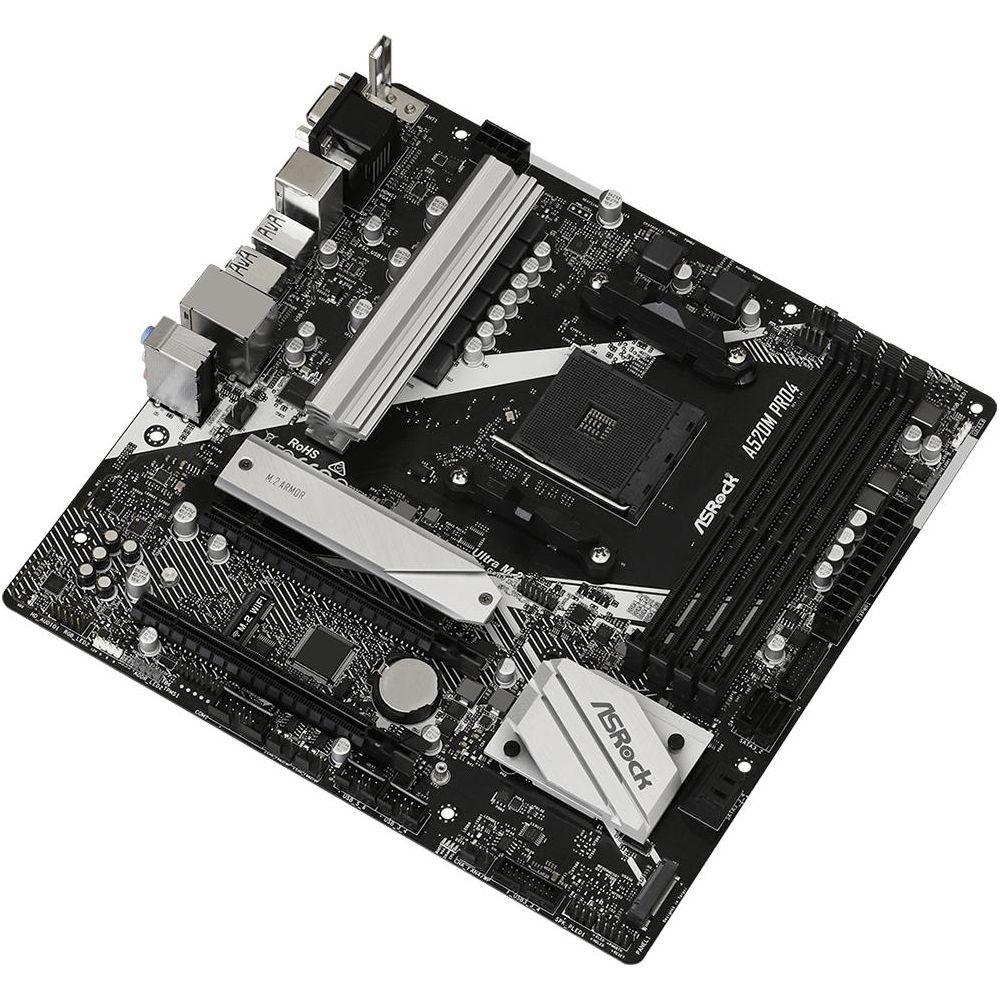 Płyta główna ASRock A520M PRO4 z gniazdem CPU, slotami RAM i radiatorami.