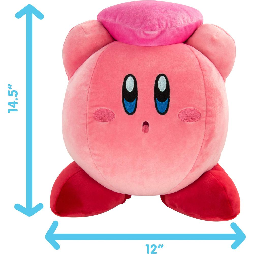 Ein rosafarbener Kirby-Plüsch mit roten Füßen und einem rosa Hut.