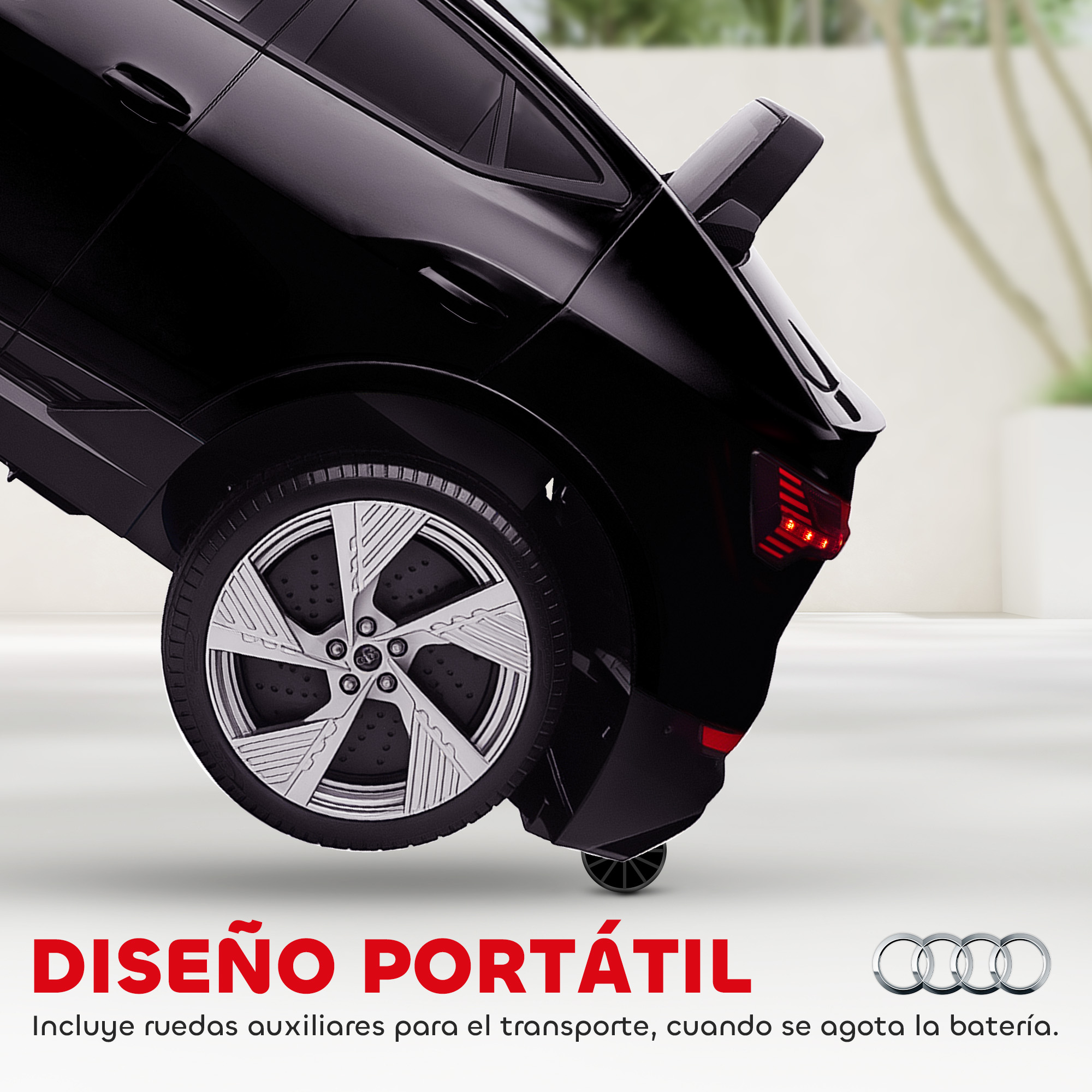 Coche eléctrico negro de juguete con ruedas plateadas y luces traseras rojas.