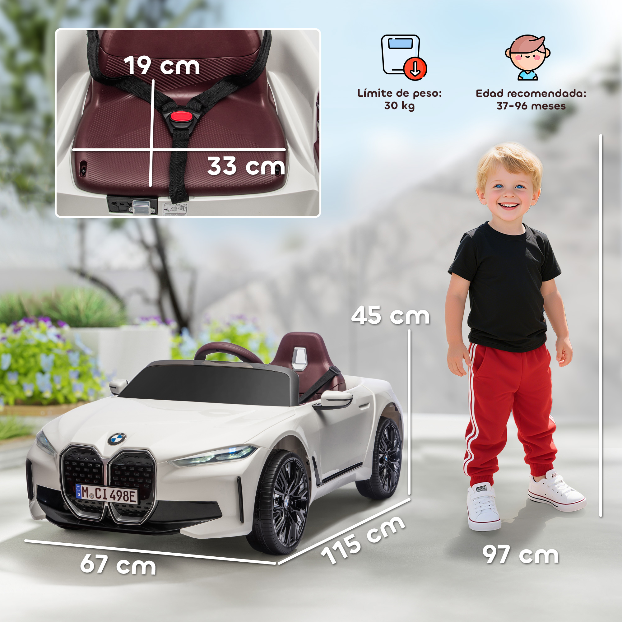 Un coche eléctrico BMW blanco para niños con un niño.