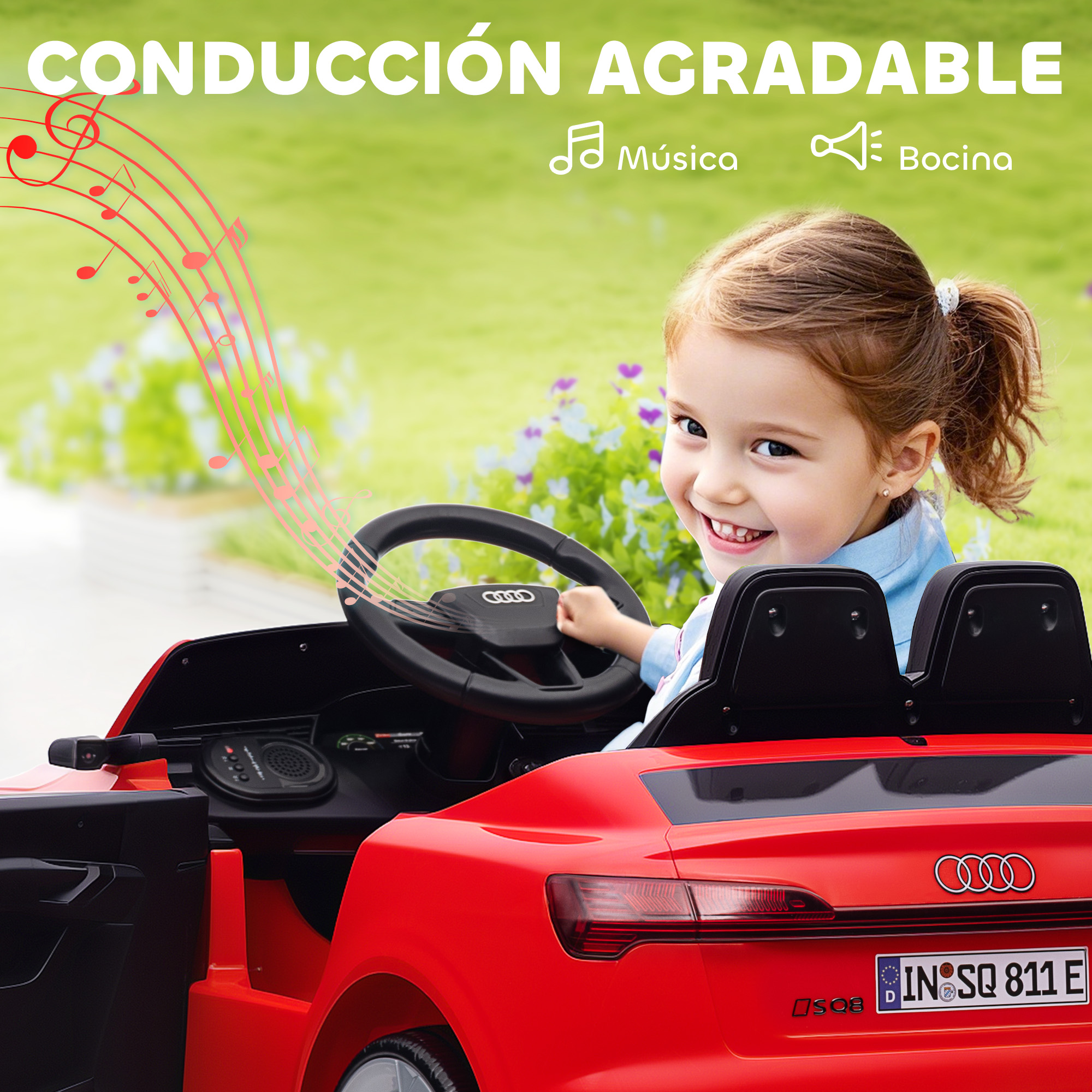 Una niña conduce un coche eléctrico rojo con notas musicales y texto "Música".