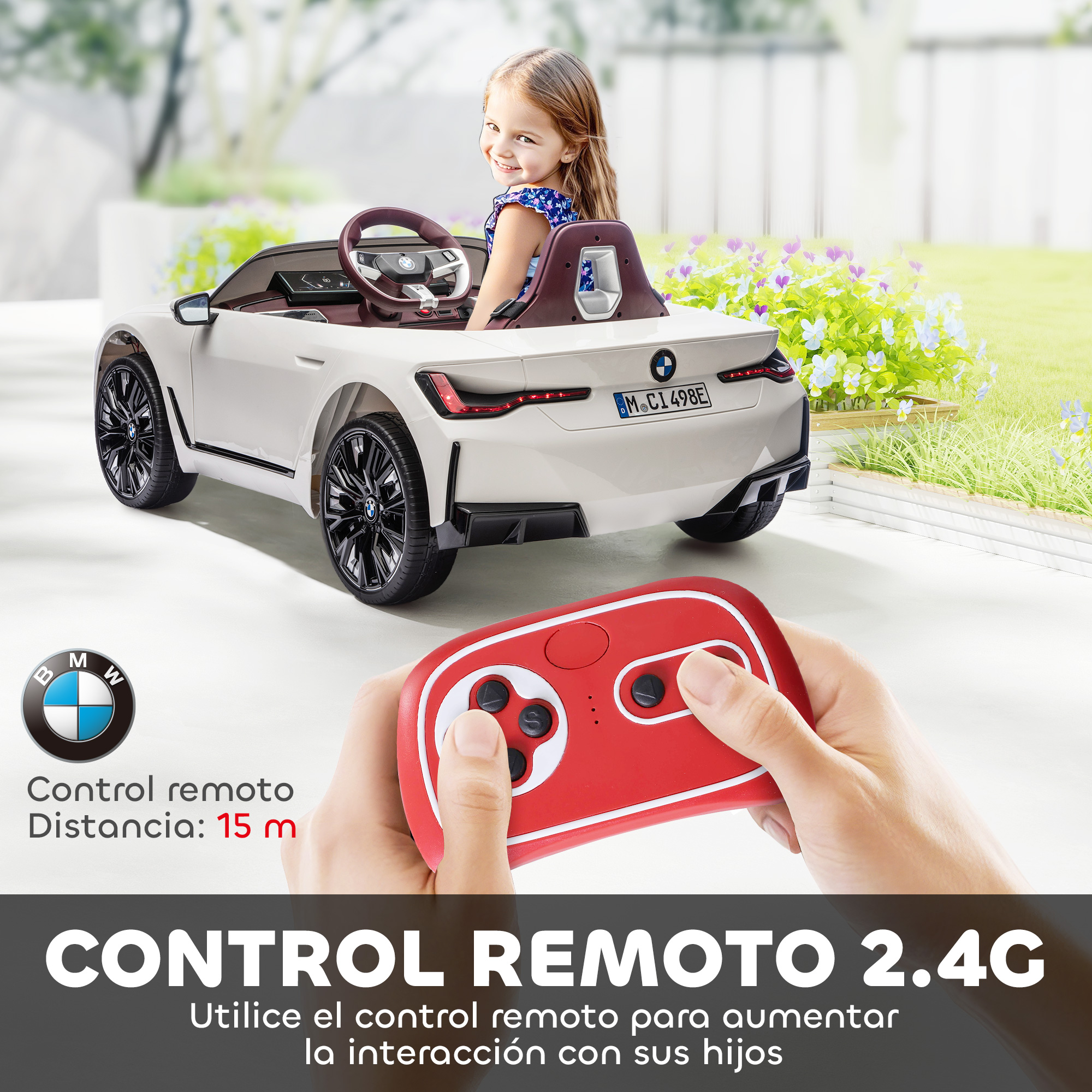Un coche eléctrico BMW blanco con una niña dentro, mando a distancia en primer plano.