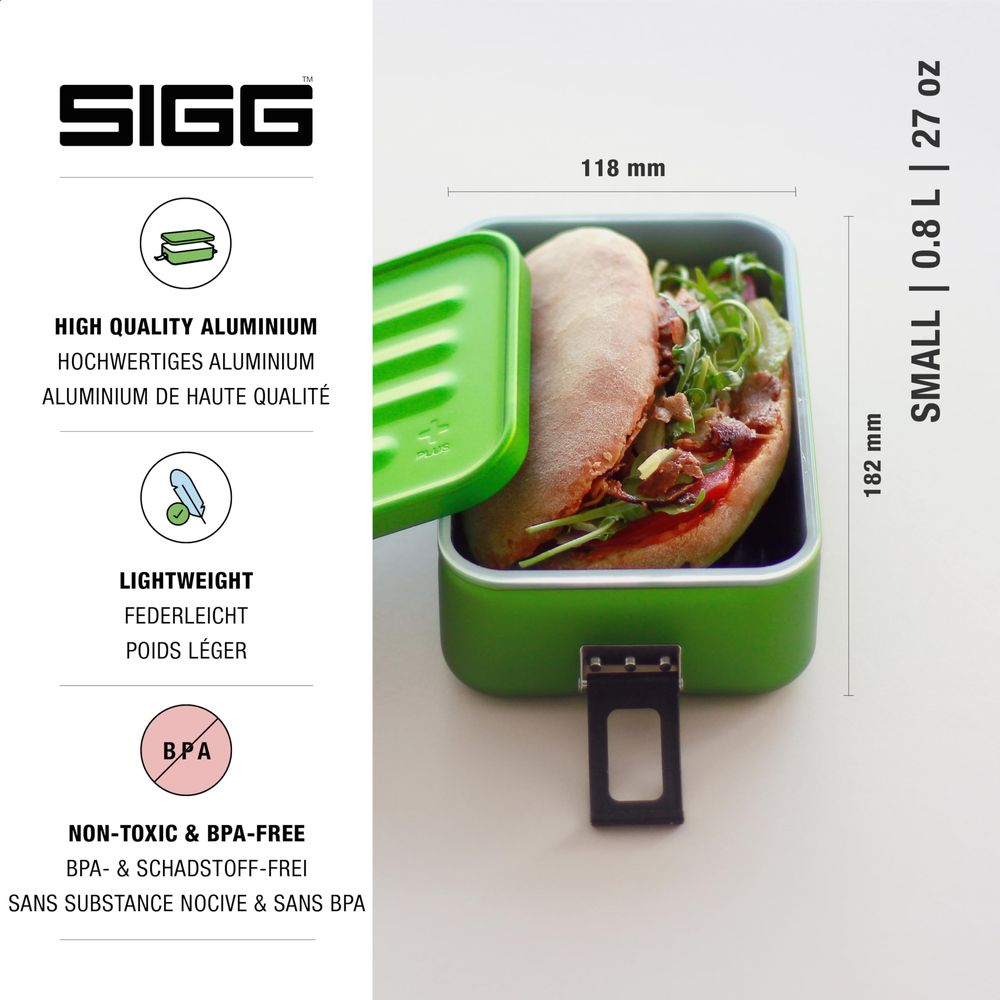 Eine grüne Lunchbox mit einem Sandwich und Maßen. Oben steht SIGG.