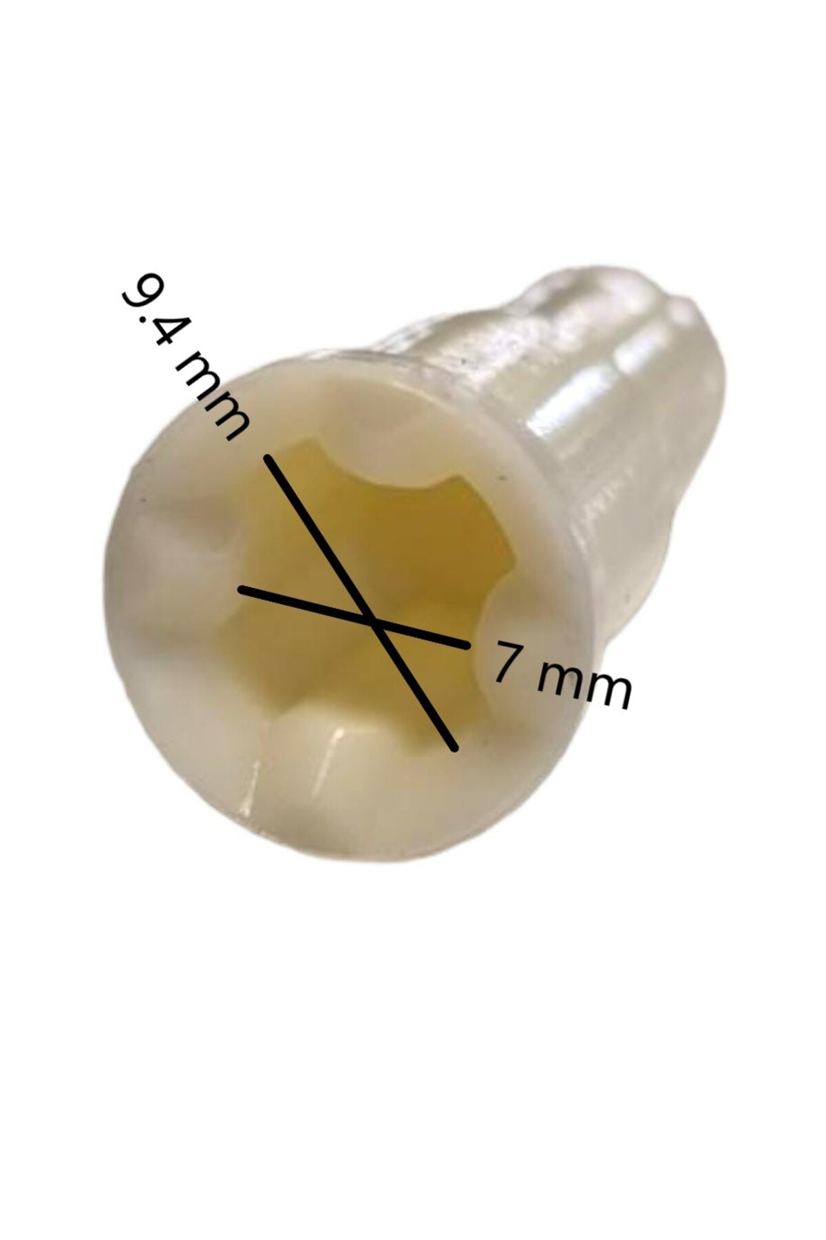 Krem rengi, yıldız şeklinde plastik tıpa, ölçüleri 9,4 mm ve 7 mm.