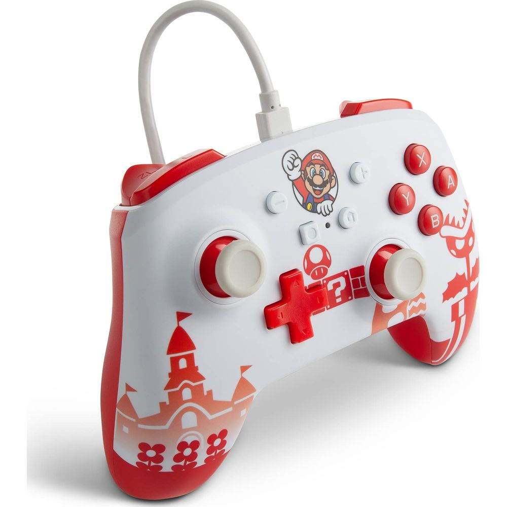 Biały kontroler Nintendo z czerwonymi akcentami, wizerunkami Mario i zamkiem.