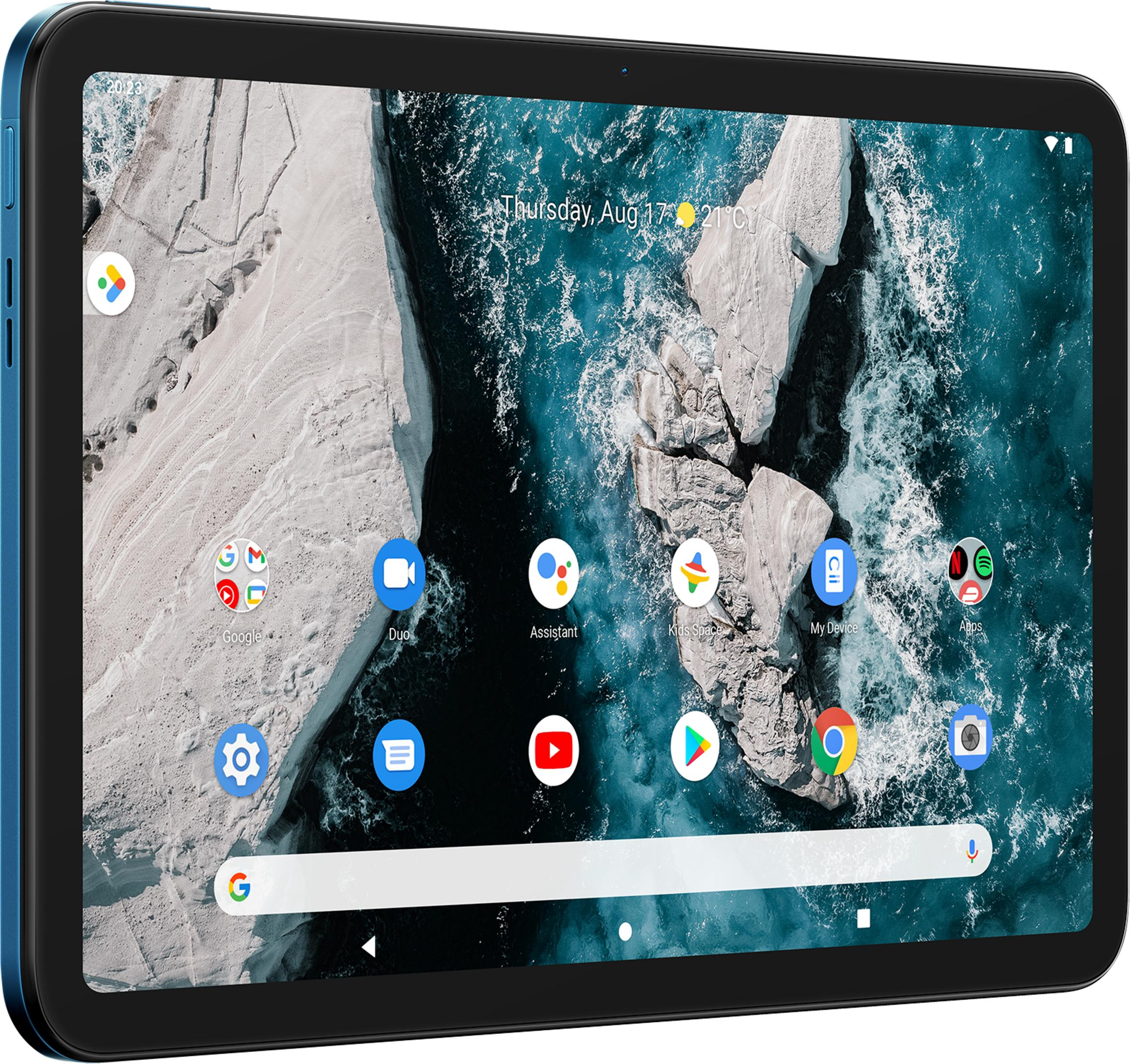 Ein blaues Tablet mit einem Hintergrundbild von Felsen und Meer. Viele Google-Apps sind sichtbar.