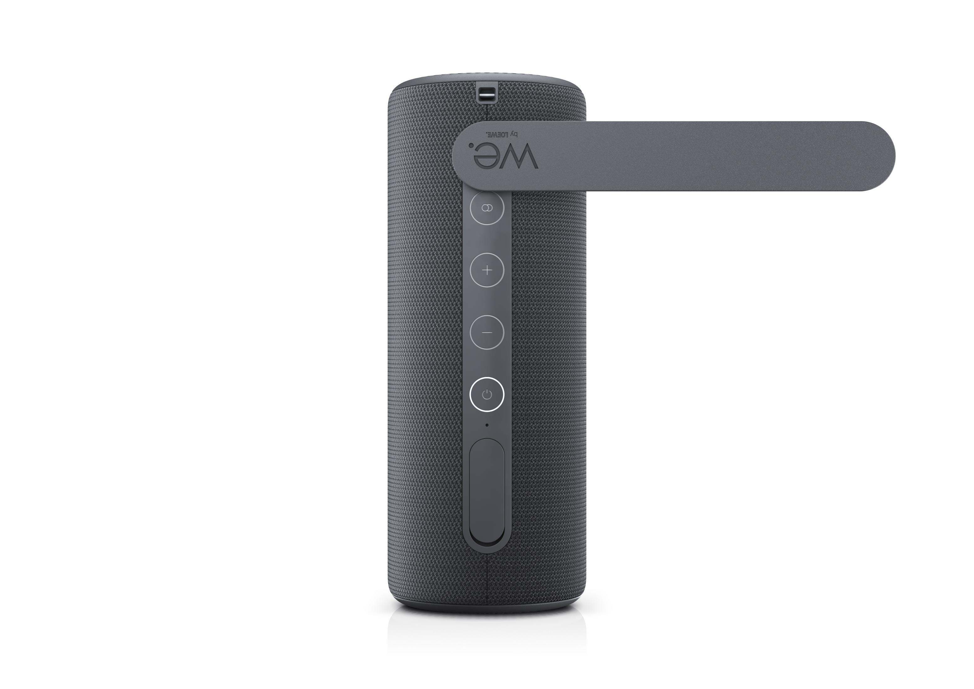 Grauer Bluetooth-Lautsprecher mit Tragegriff und Bedienelementen.