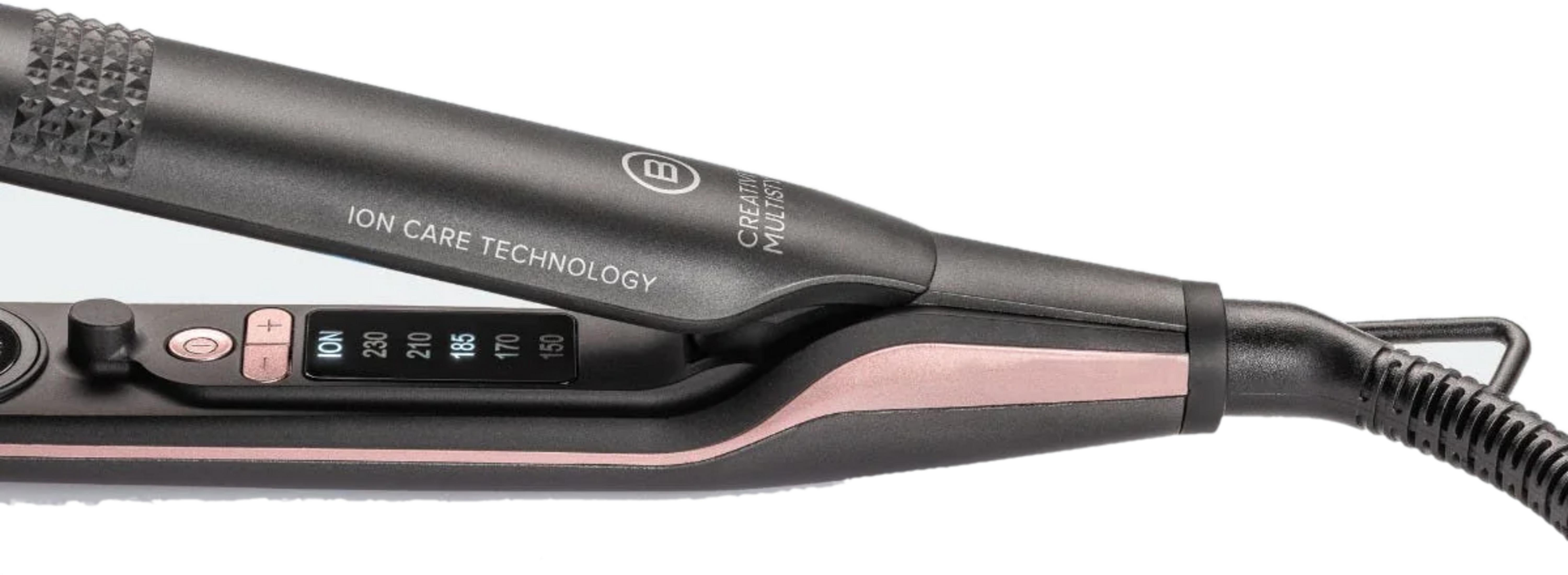 Czarna prostownica z różowo-złotymi akcentami i cyfrowym wyświetlaczem.