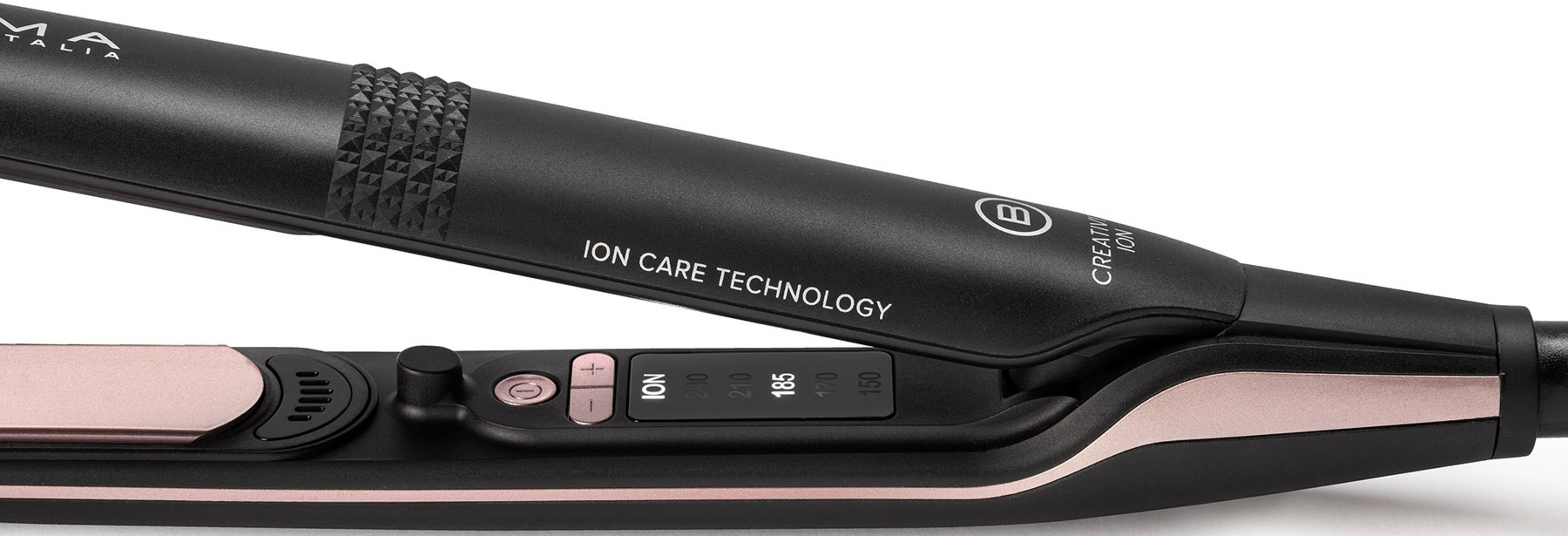 Czarna prostownica z różowo-złotymi akcentami, wyświetlaczem LCD i przyciskami.