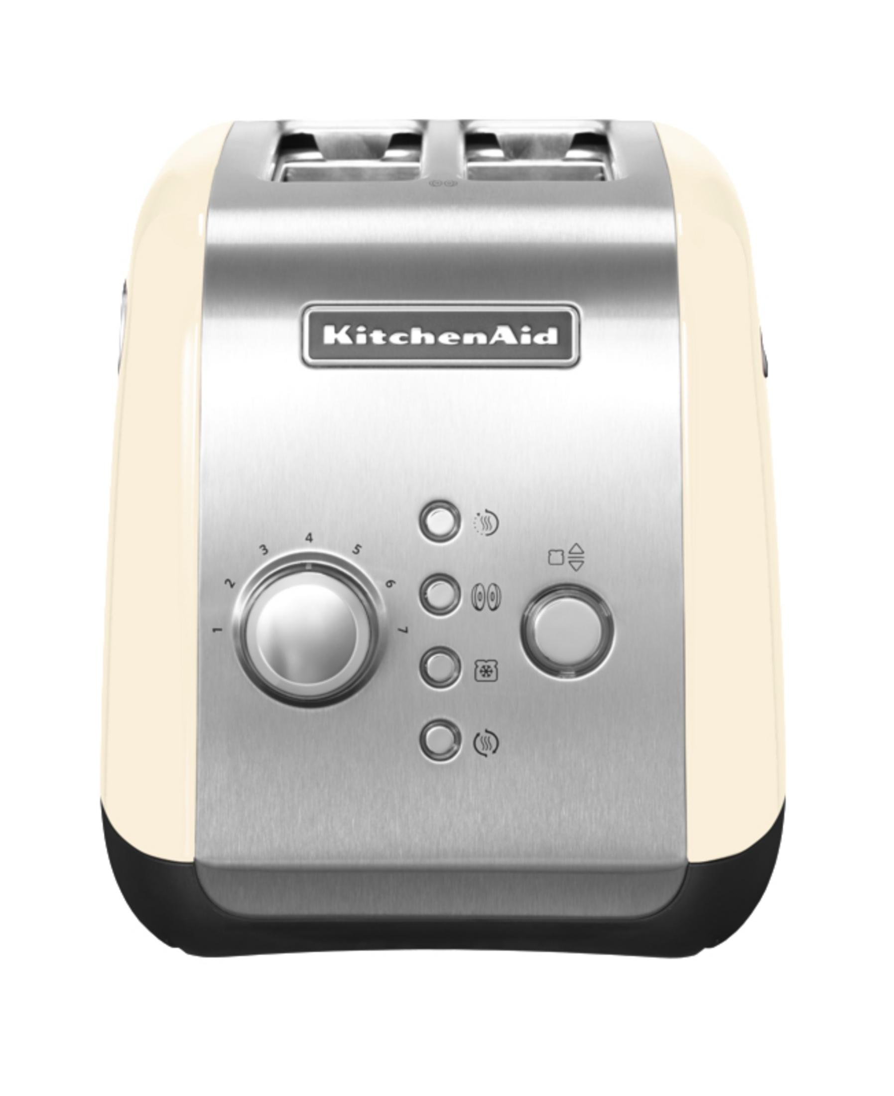 A cream-colored KitchenAid toaster with stainless steel accents and controls.