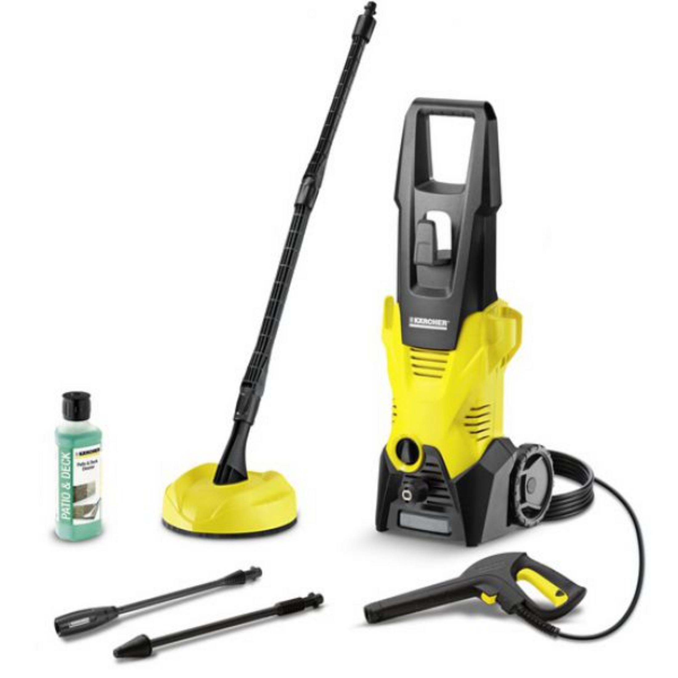 Idropulitrice gialla e nera con accessori: pulitore flaconi, lancia, ugelli e pistola.