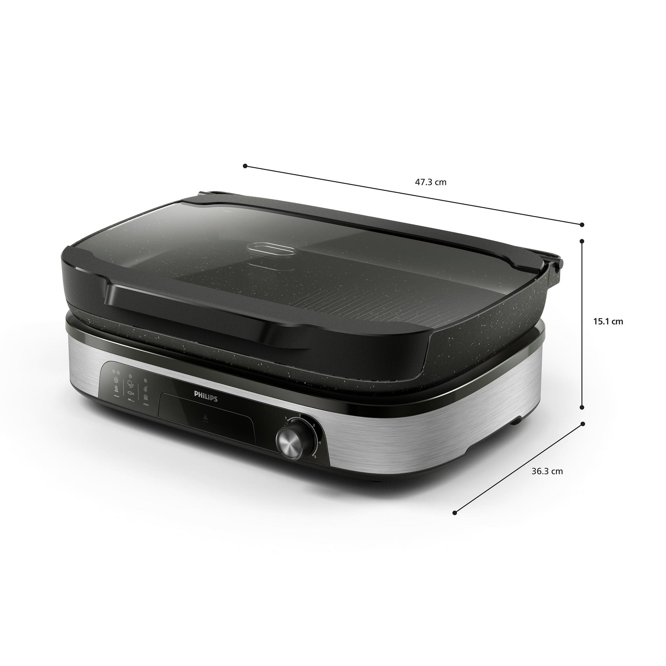 Czarny grill kontaktowy Philips ze szklaną pokrywą. Wymiary: 47,3x36,3x15,1cm.