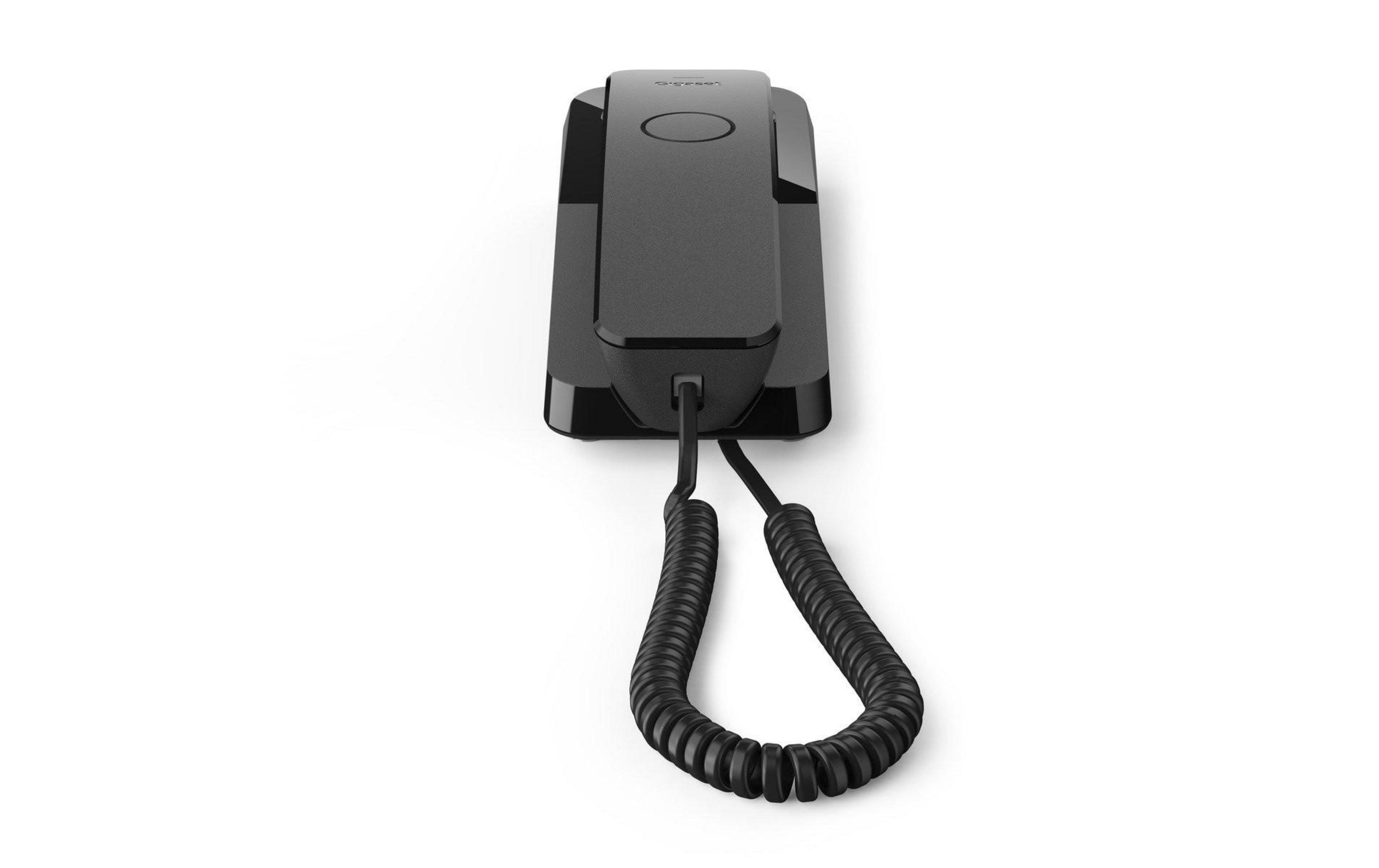 Un telefono nero con cavo e cavo a spirale su sfondo bianco.