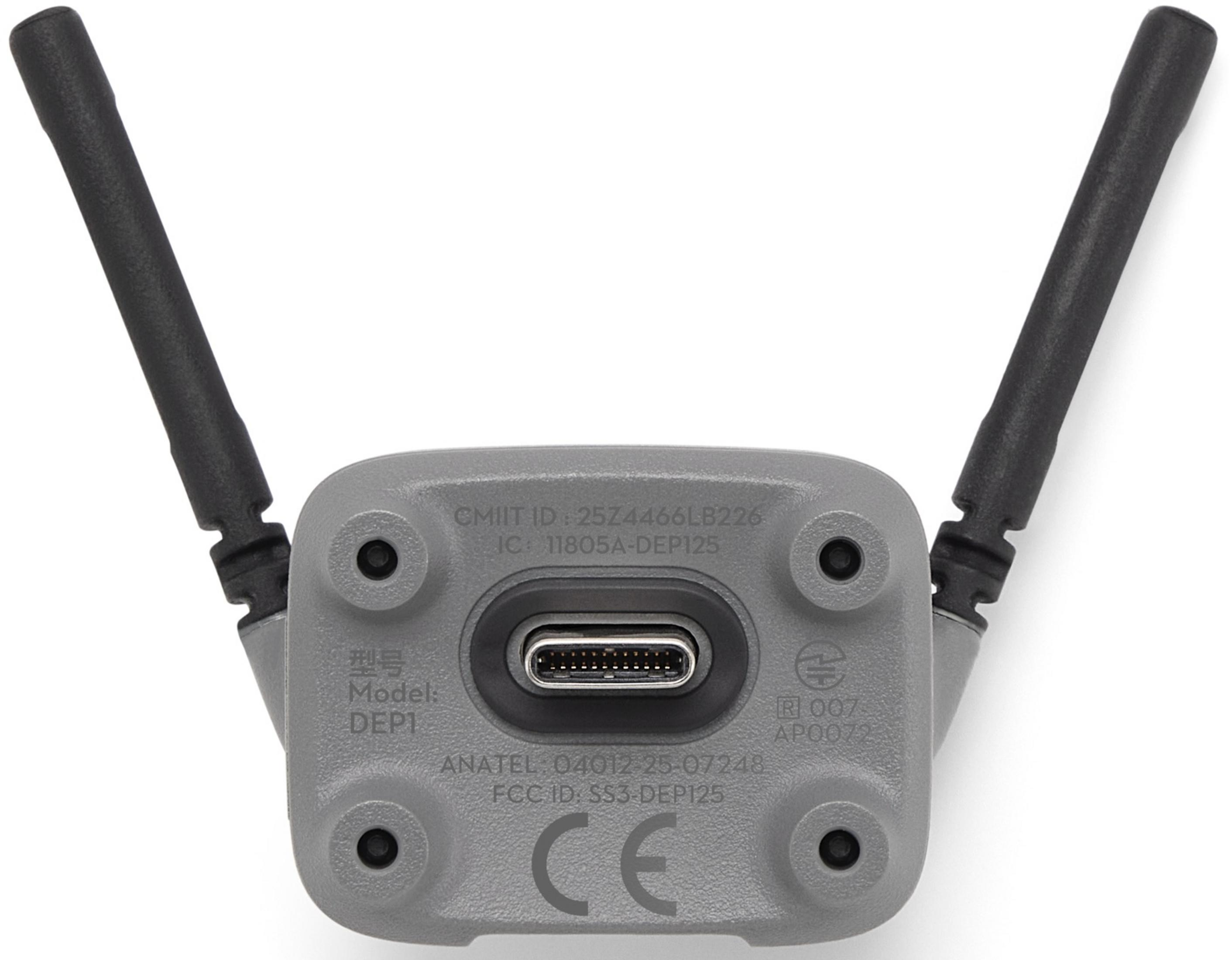 Graues Gerät mit zwei schwarzen Antennen und USB-C-Anschluss.