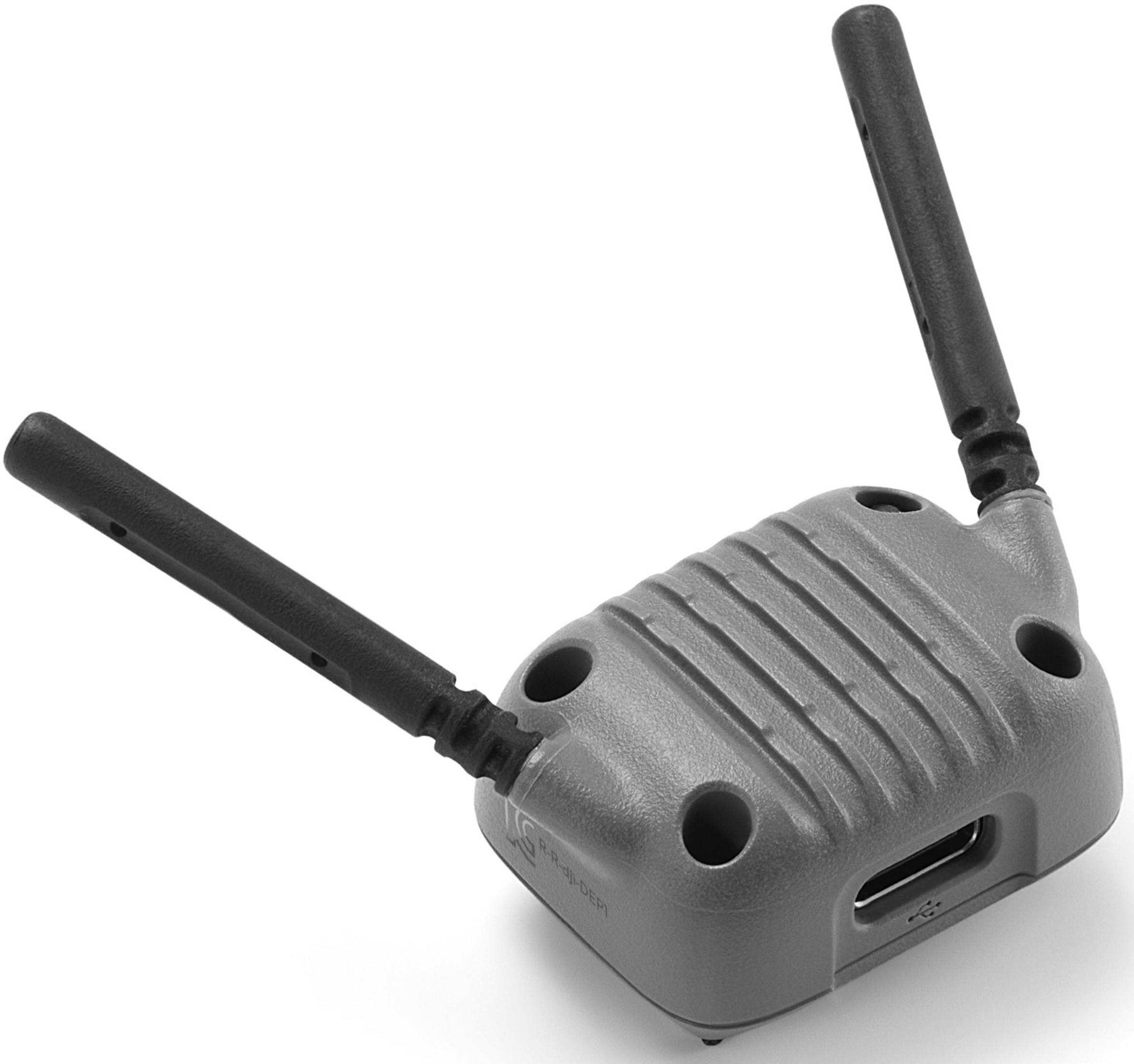 Graues Gerät mit zwei schwarzen Antennen und USB-Anschluss.