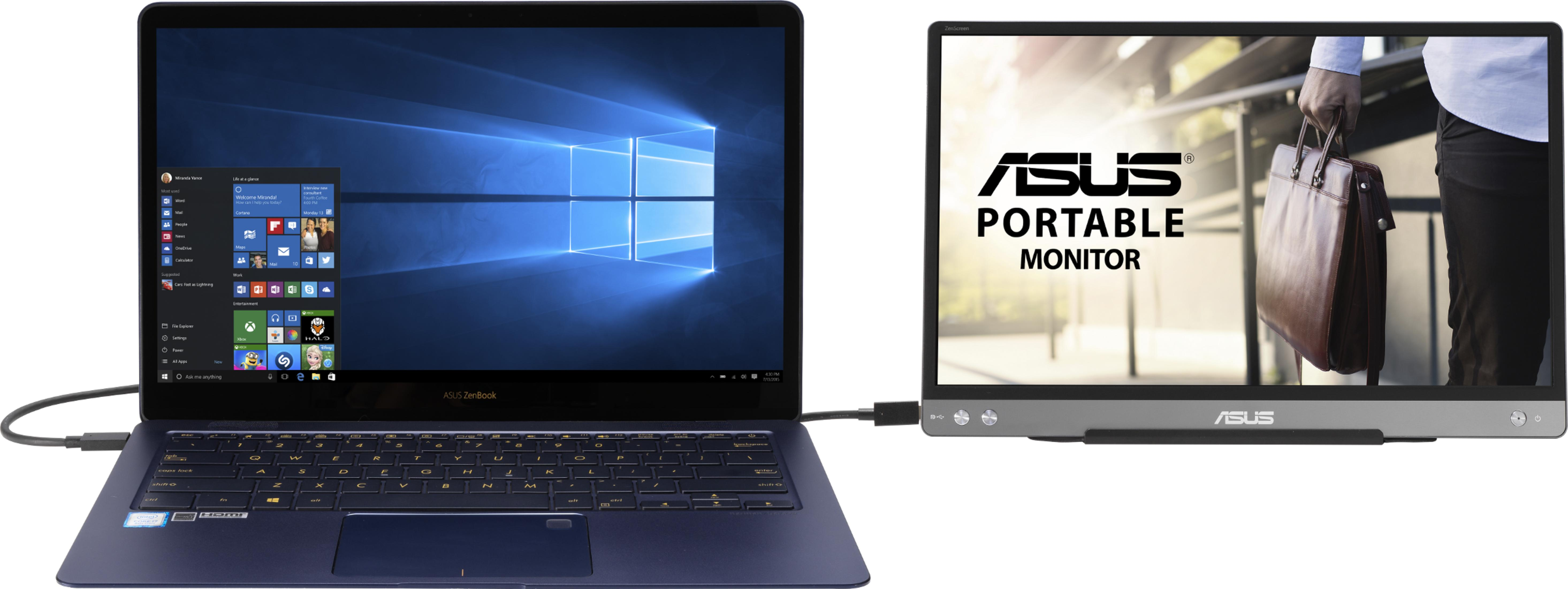 Ciemny laptop Asus ZenBook podłączony do zewnętrznego monitora Asus. Laptop wyświetla system Windows 10.