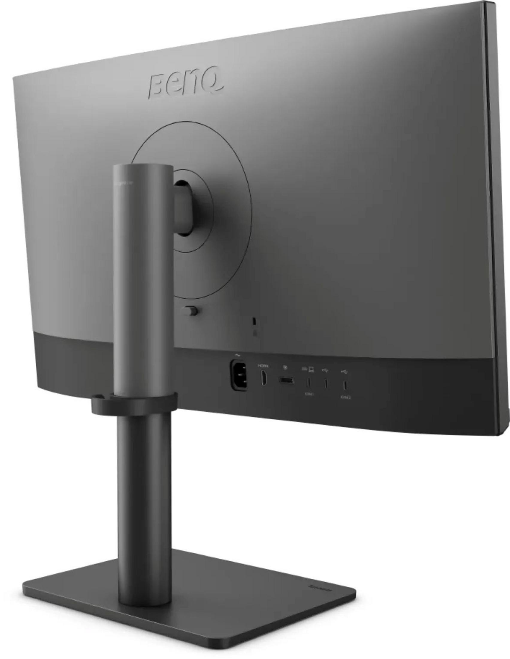 Achterkant van een grijze monitor met standaard en poorten.