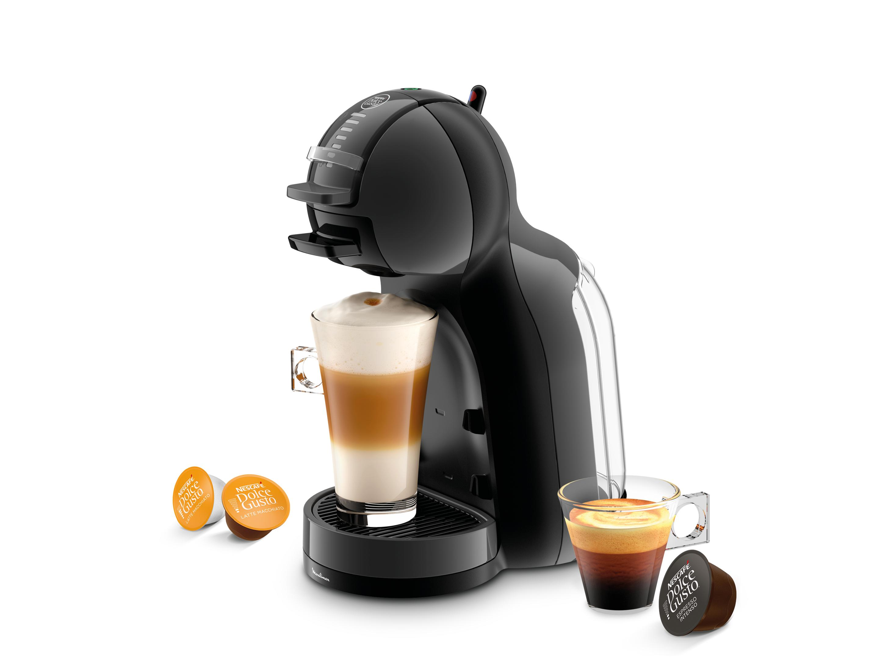 Czarna ekspres do kawy z latte macchiato i espresso, obok kapsułki.