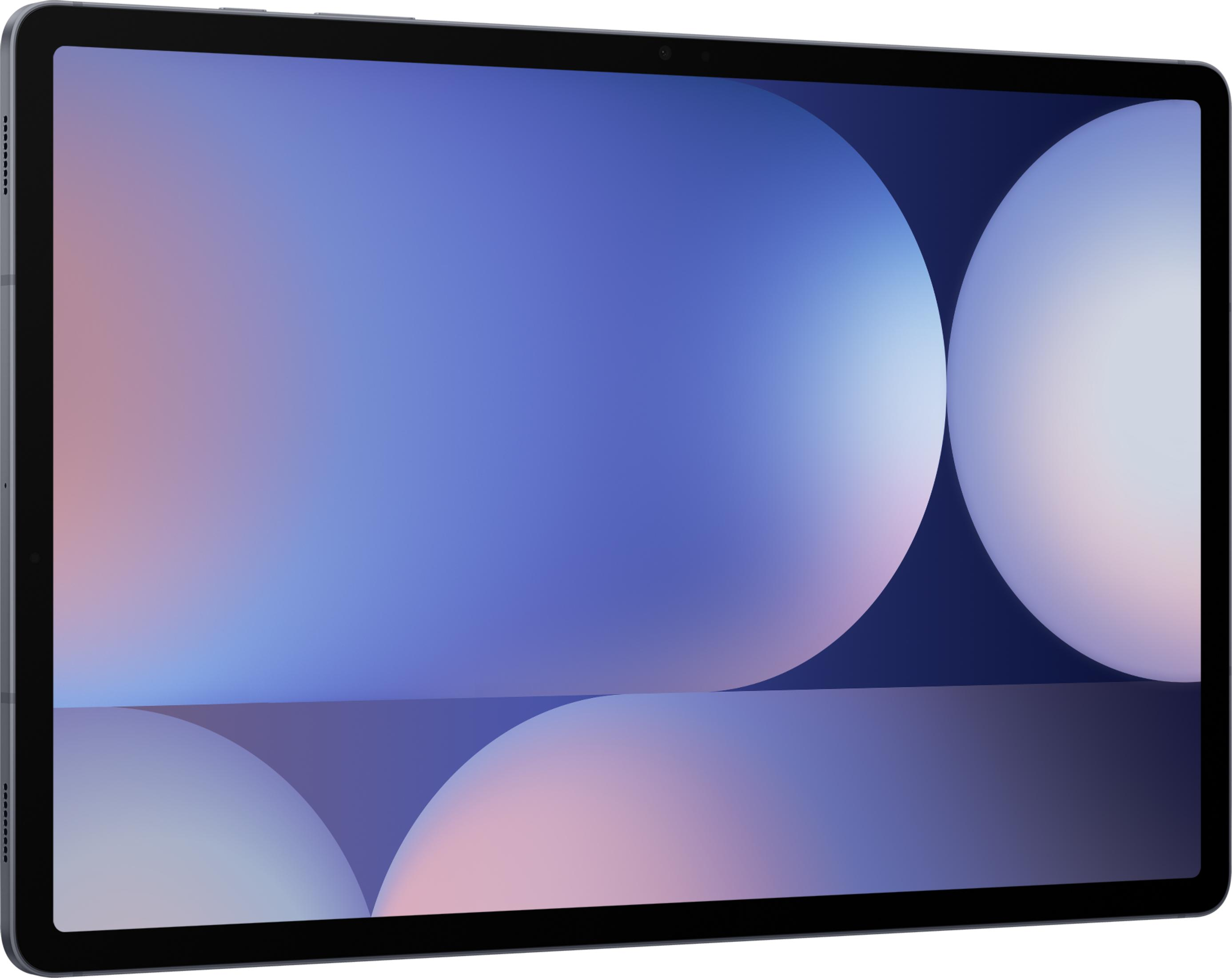 Tablet z abstrakcyjnym tłem niebieskich i różowych kół.