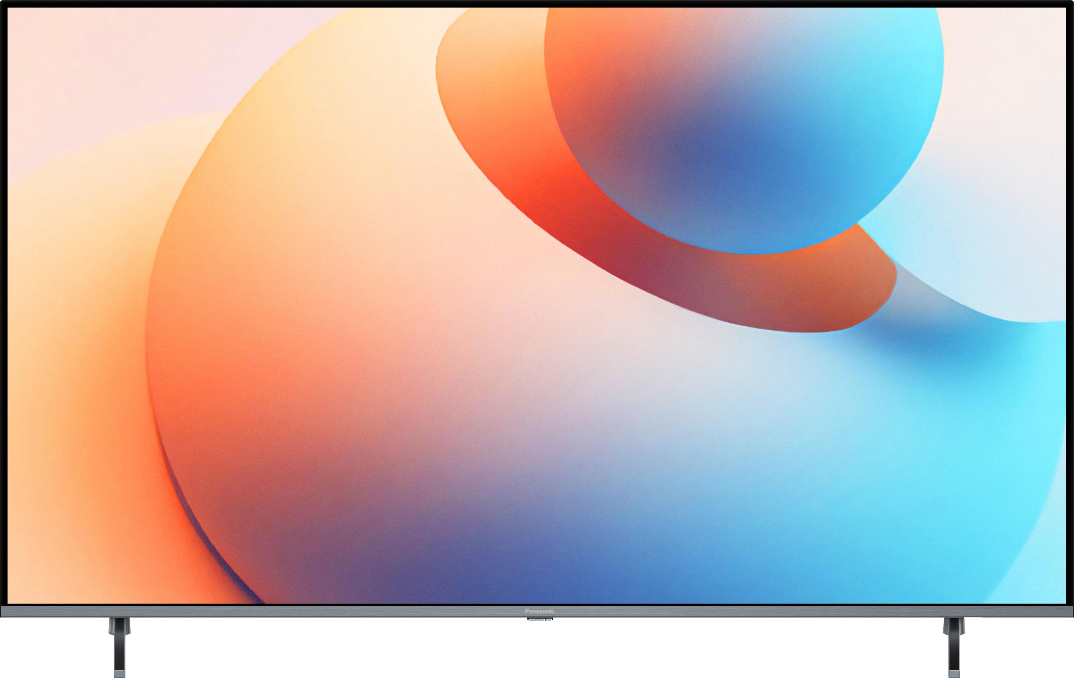 Un televisore moderno con uno sfondo astratto sfumato.
