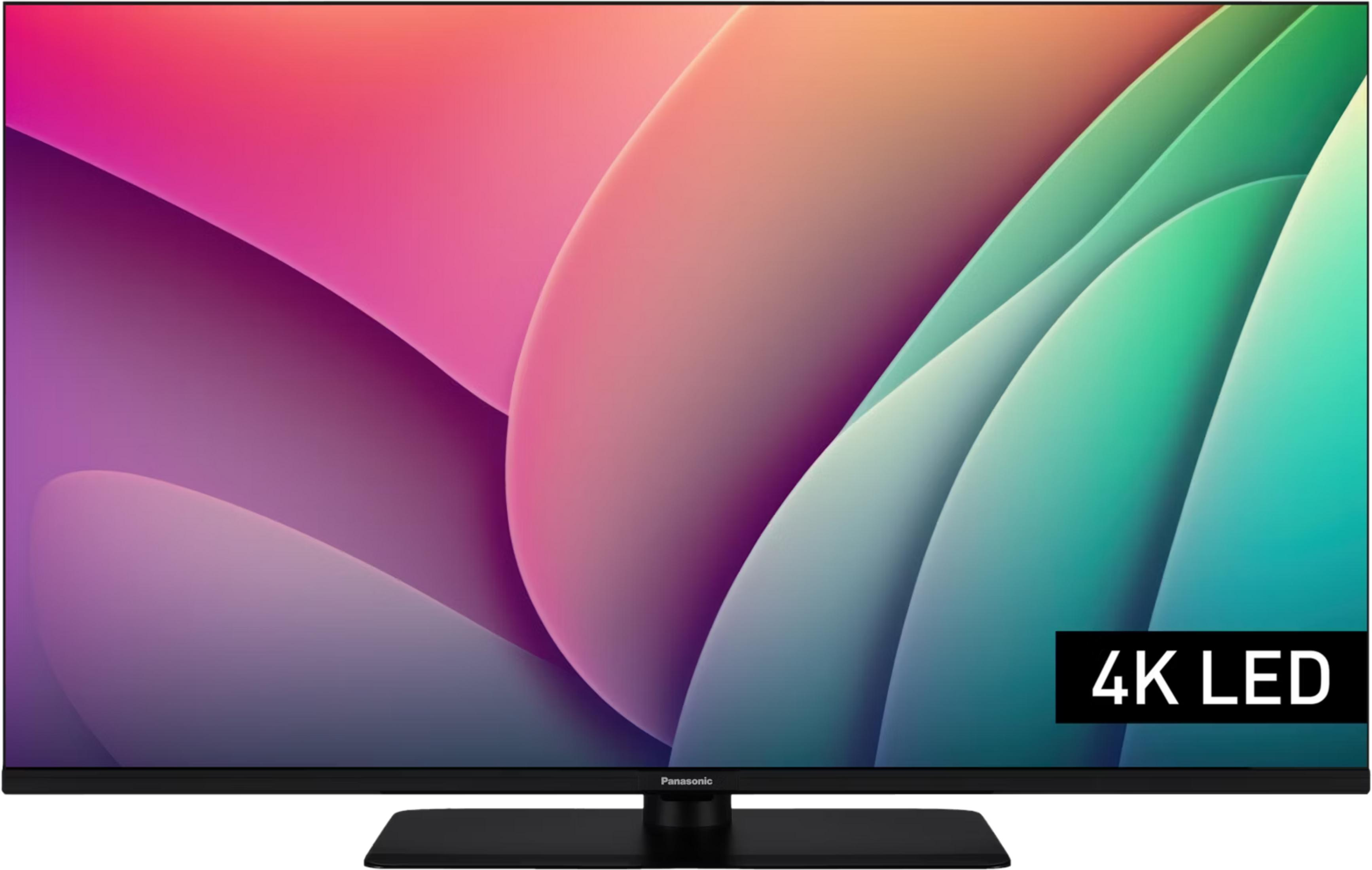 Telewizor Panasonic 4K LED z kolorowymi, abstrakcyjnymi kształtami.