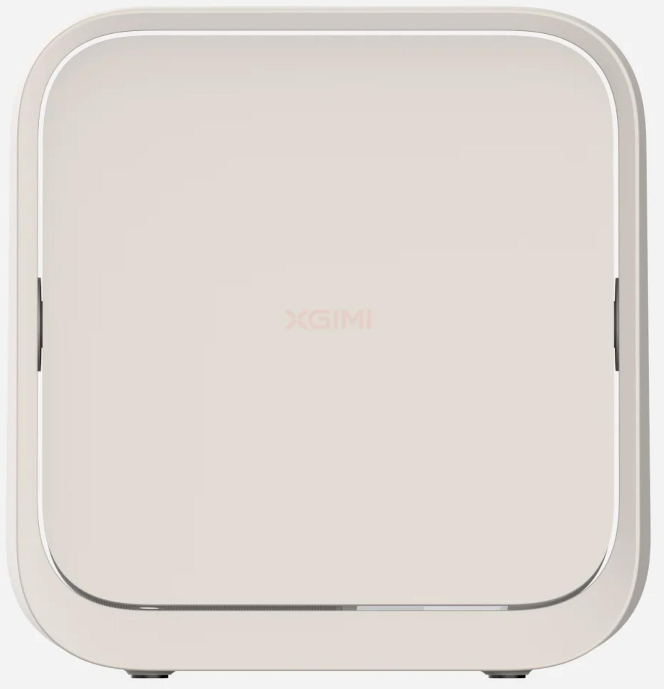 A cream-colored, square box with rounded corners and a silver trim.