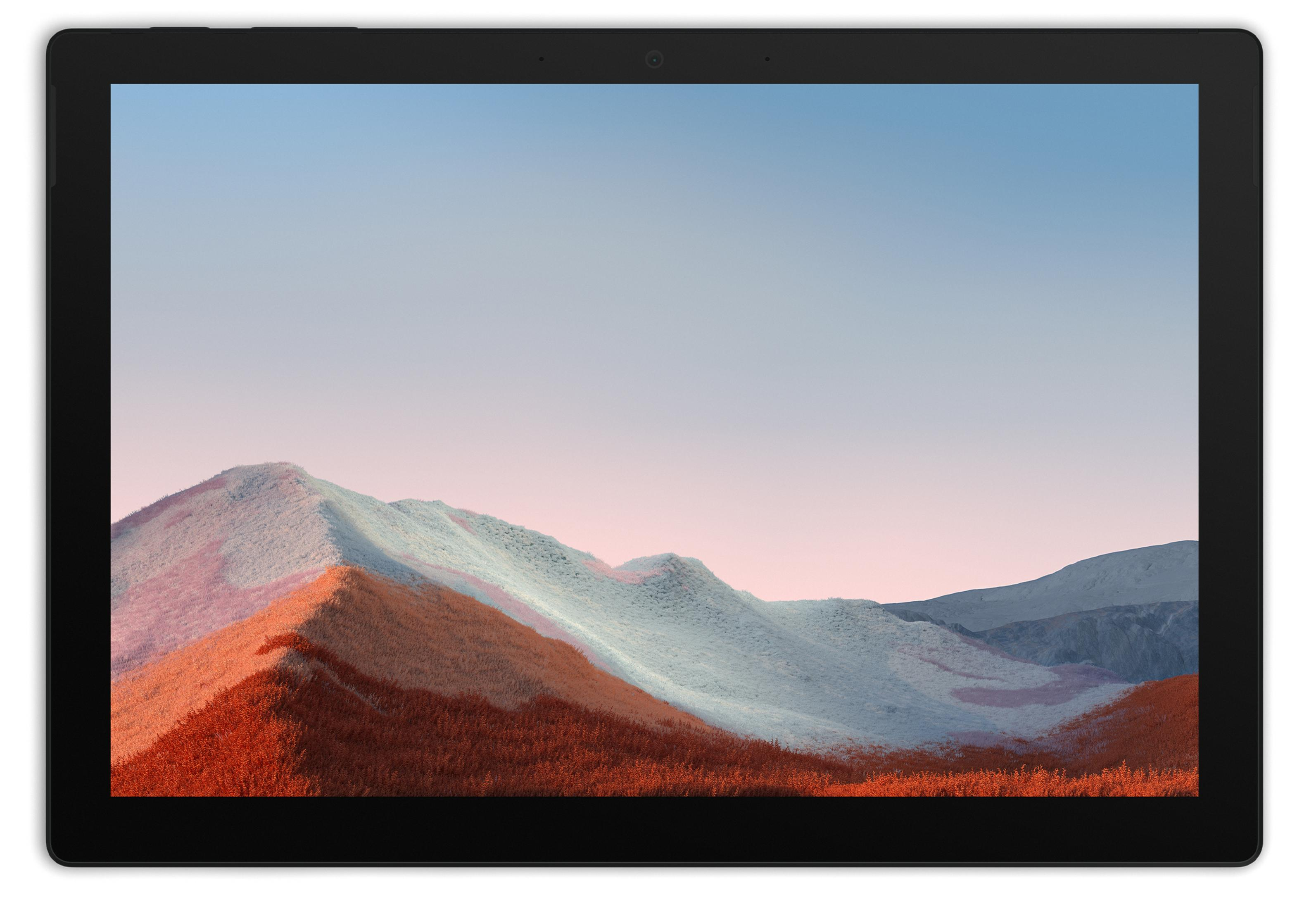 Bergige Landschaft mit orangefarbenen und blauen Hügeln unter einem rosafarbenen Himmel.