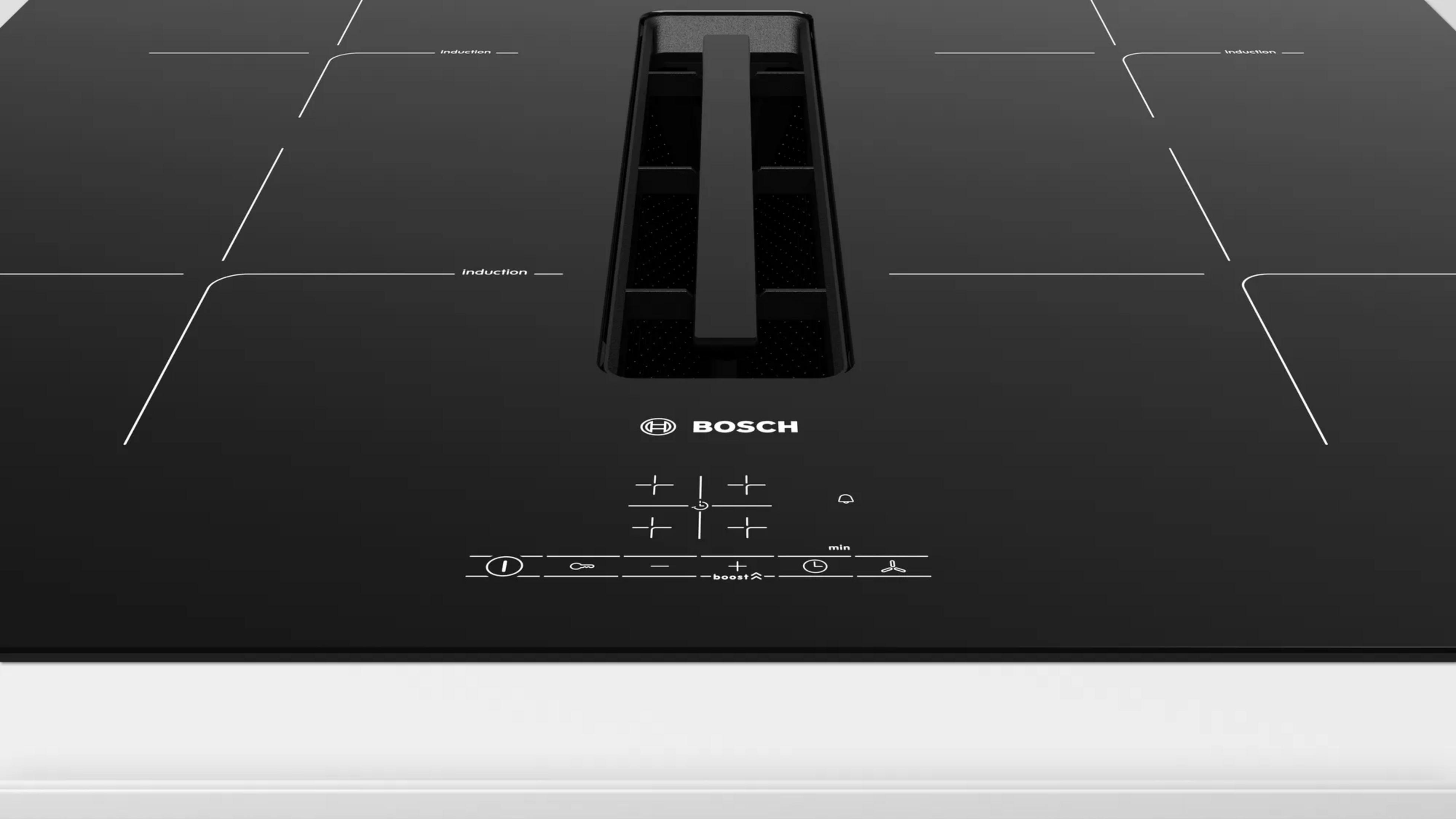 Placa de inducción negra con extractor integrado y controles táctiles.