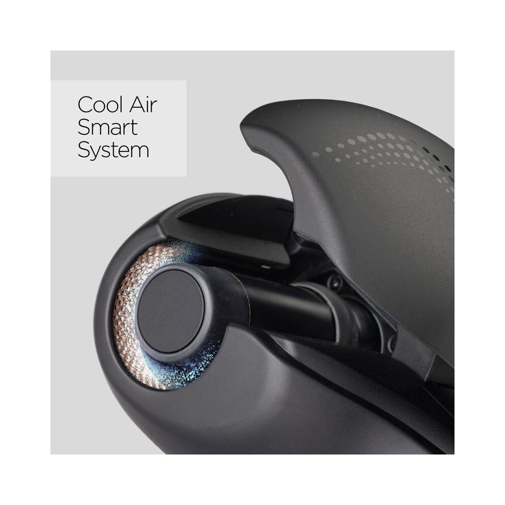 Zbliżenie czarnej lokówki z brokatowymi akcentami.