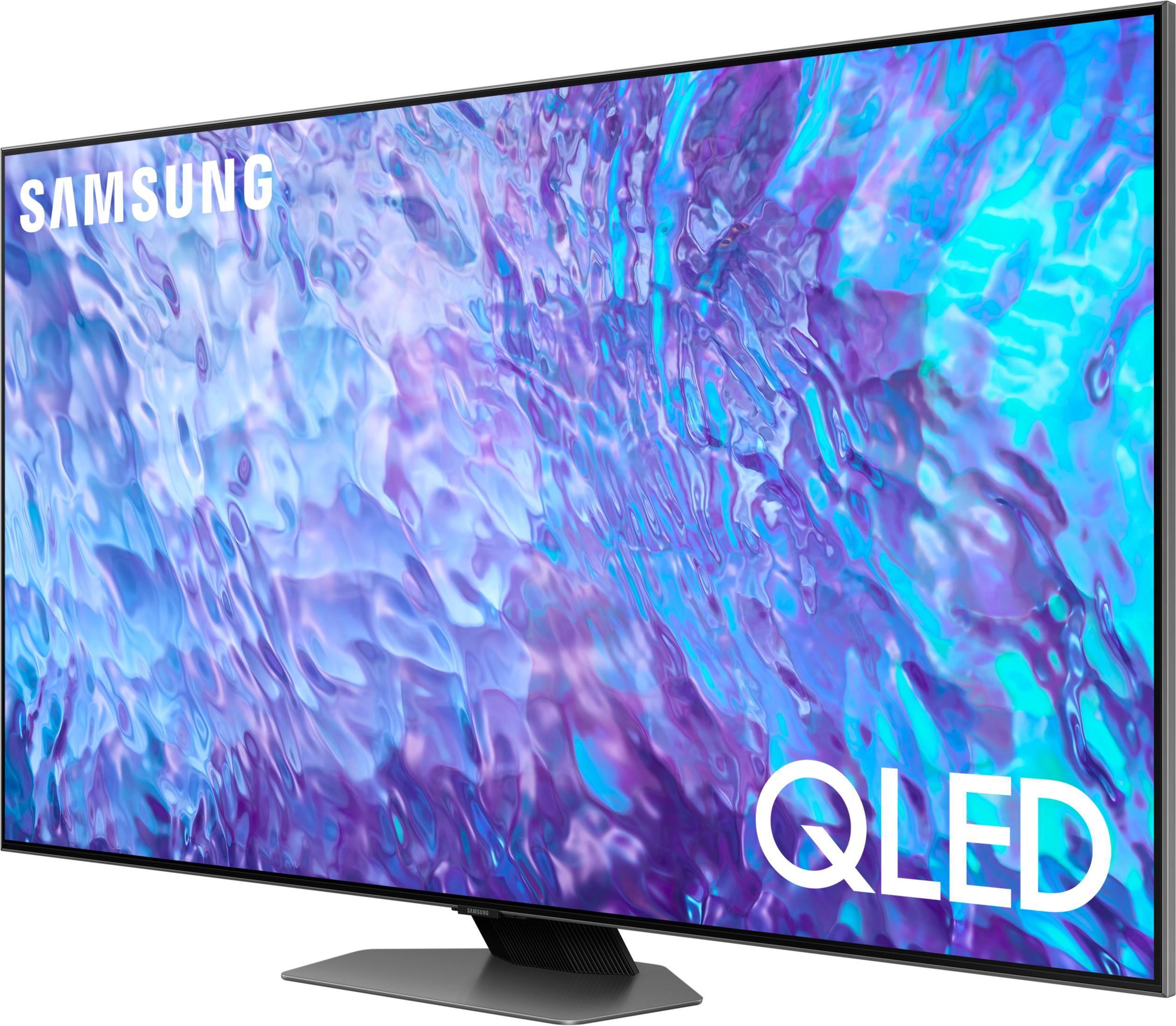 Ein Samsung QLED Fernseher mit einem abstrakten, flüssigen Bildschirm in Blau- und Lilatönen.