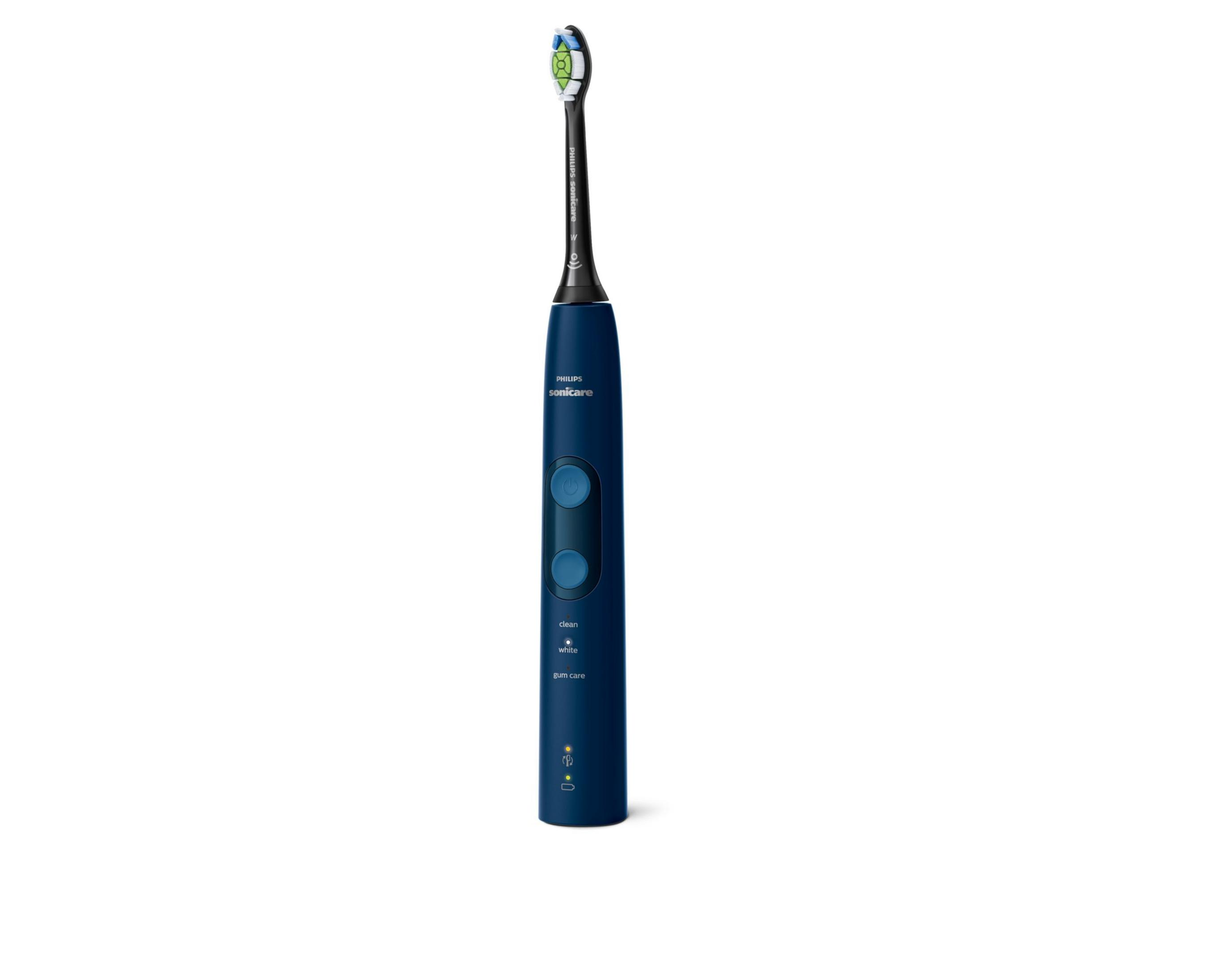 Uno spazzolino elettrico blu scuro con testina bianca e verde.